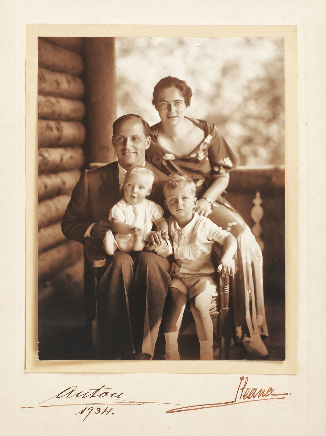 Photograph illustrating Princess Ileana, daughter of Queen Marie, her husband, Archduke Anton of Austria, Prince of Tuscany and their first two children, Stephen and Marie, with an "Anton and Ileana" handwritten signature, 1934