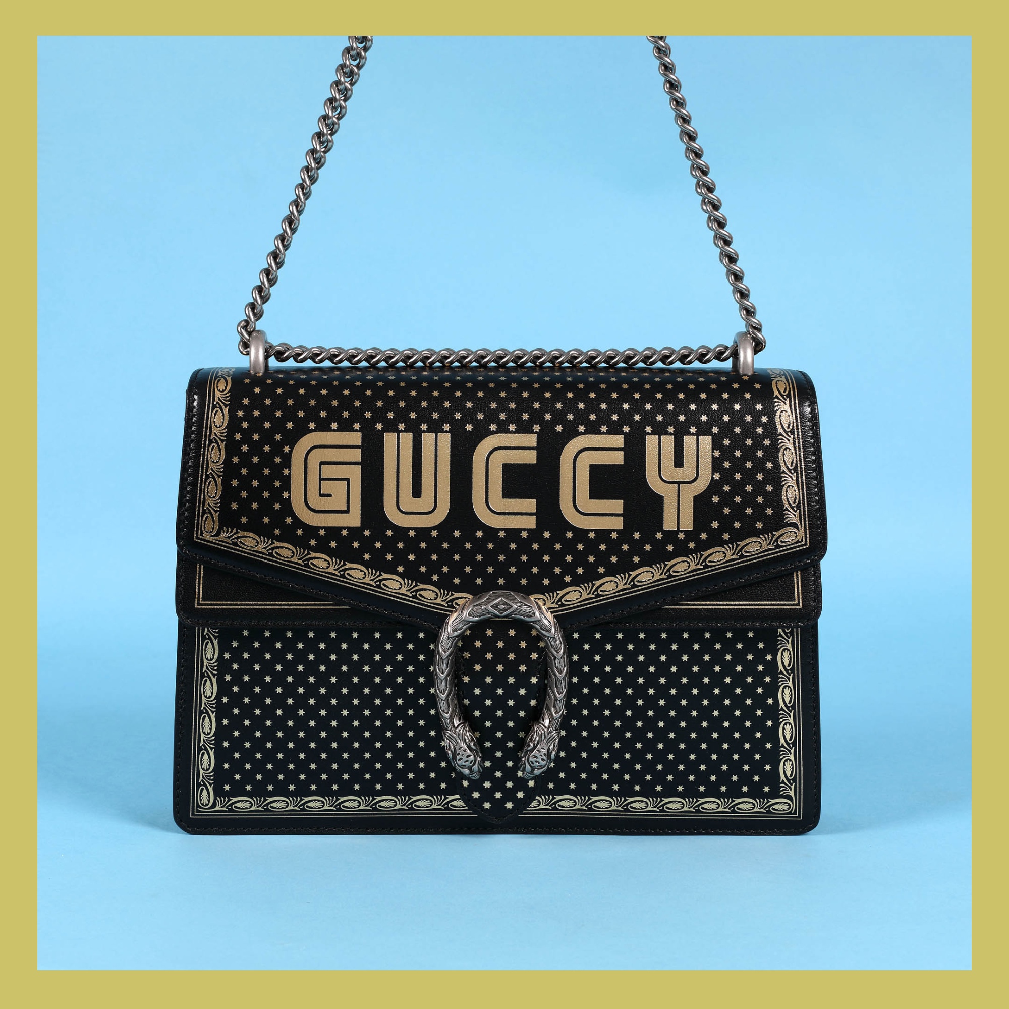 ”Dionysus” - geantă Gucci, din piele, de culoare neagră, decorată cu motive stelare, însoțită de manual de utilizare și cutia originală
