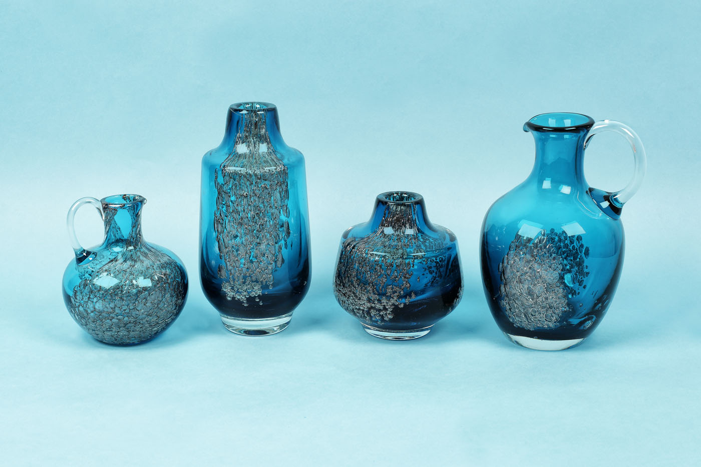 Set of 4 glass vases decorated with #, ca. 1960