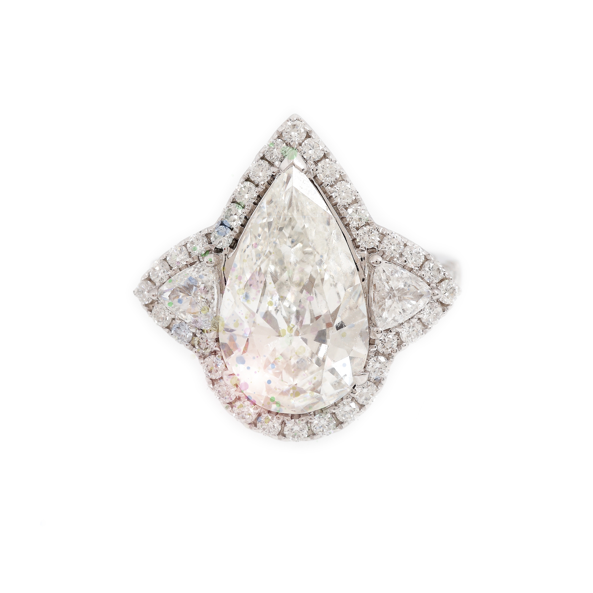 White gold ring, decorated with a central pear shaped diamond, surrounded by trillion cut and brilliant diamonds