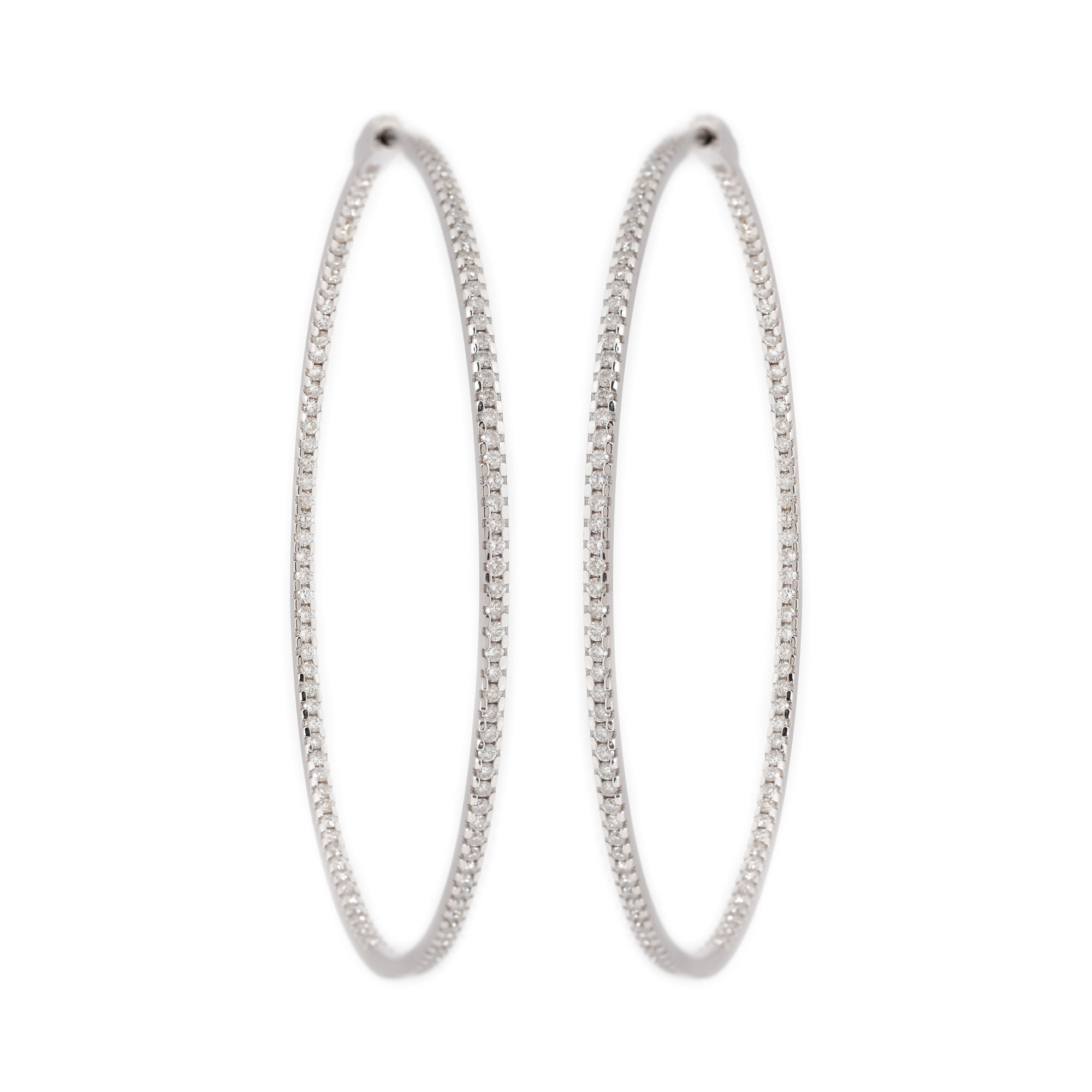 Pair of circular earrings, white gold, decorated with diamonds