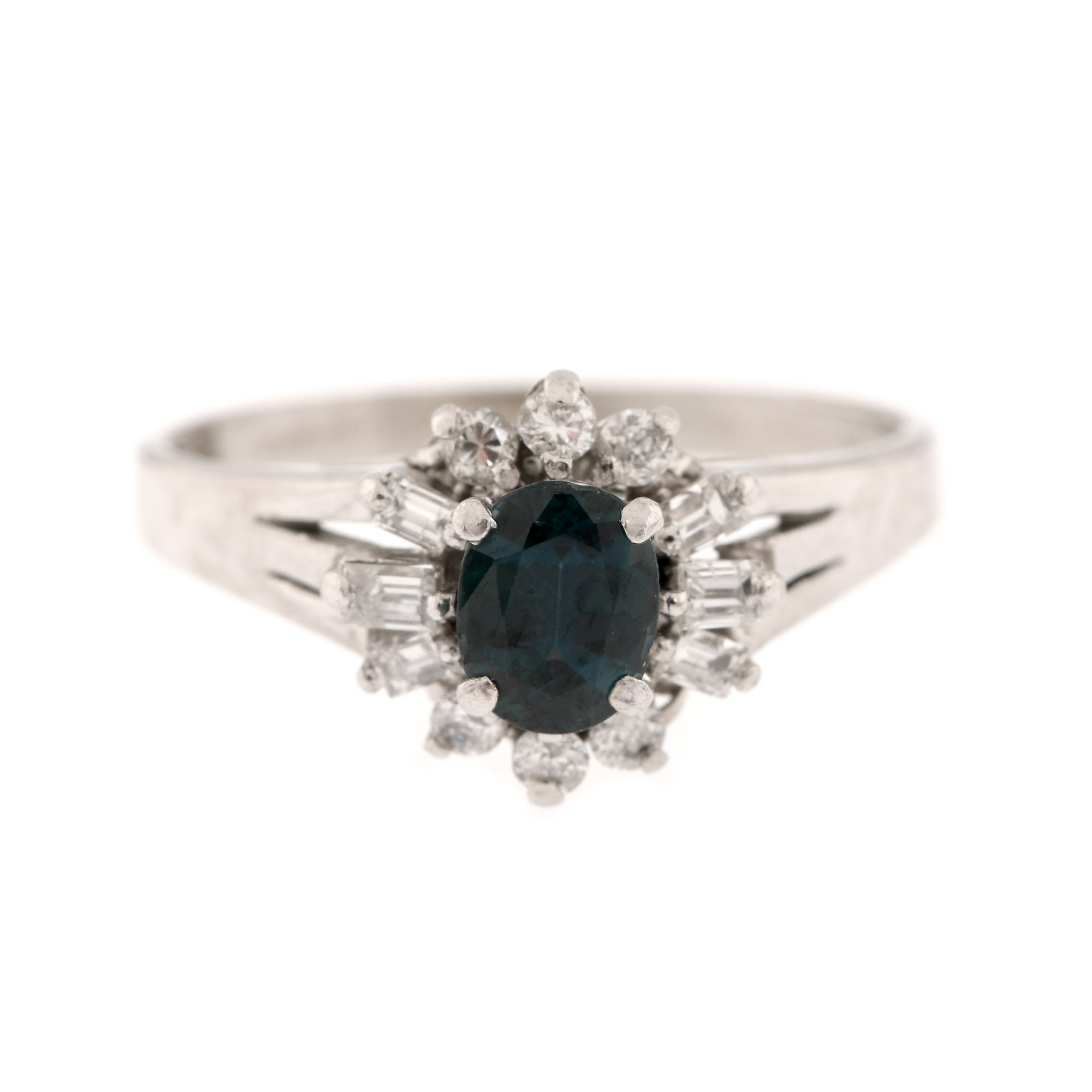 Ring, platinum, decorated with sapphire, surrounded by diamonds