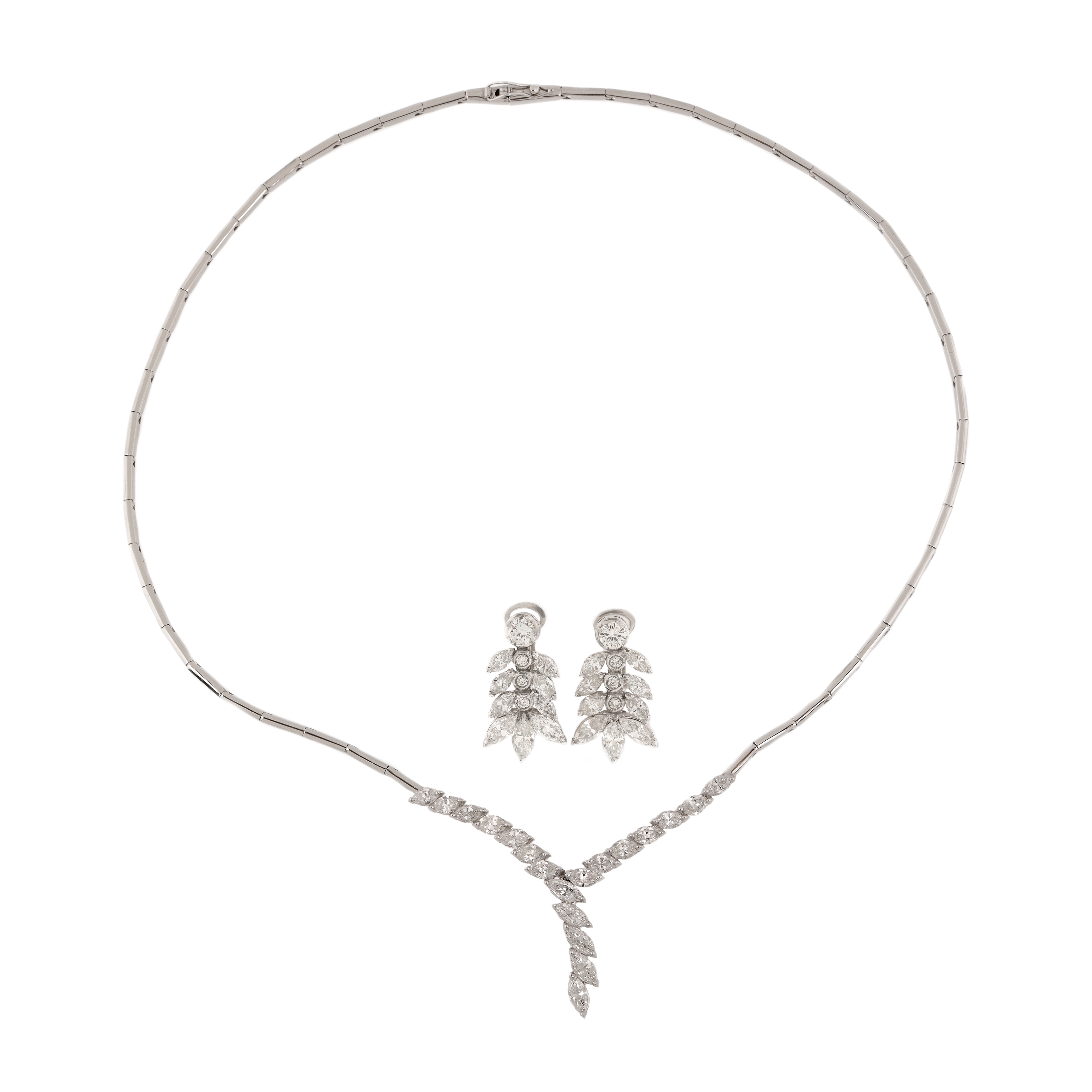 White gold set, consisting of necklace and pair of earrings, decorated with marquise  and round brilliant diamonds