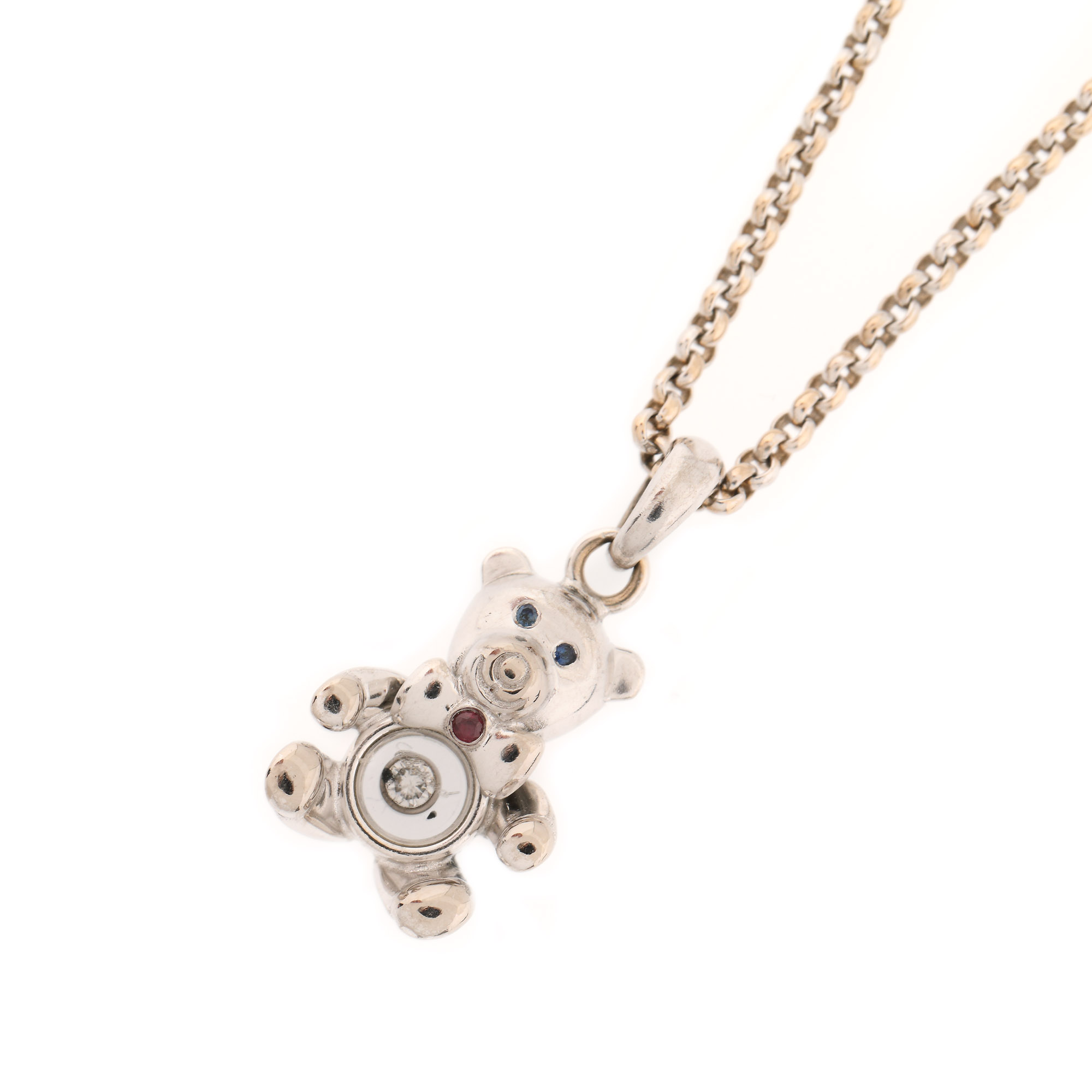 Chopard pendant chain, in the shape of a teddy bear, decorated with moving diamond, blue sapphires and one ruby