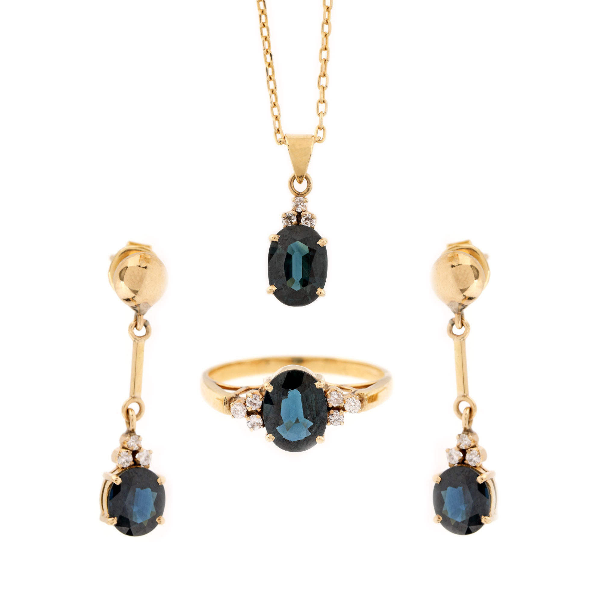 Parure, gold, consisting of pendant chain, ring and pair of earrings, decorated with sapphires and diamonds