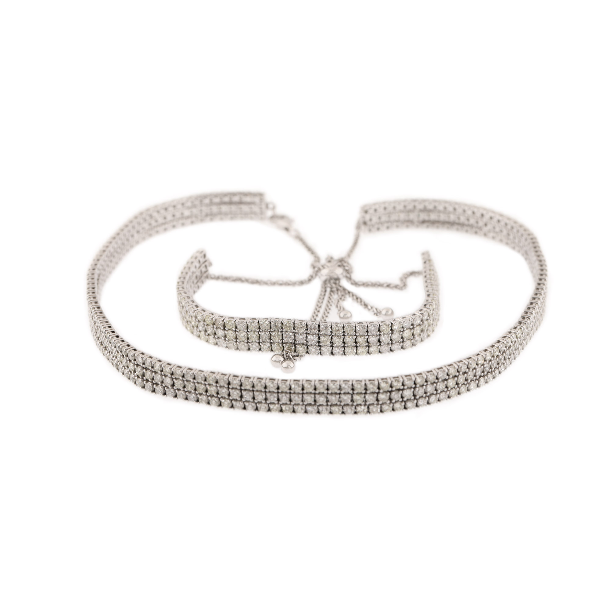 Set tennis din aur alb, format din colier și brățară, decorat cu trei rânduri de diamante