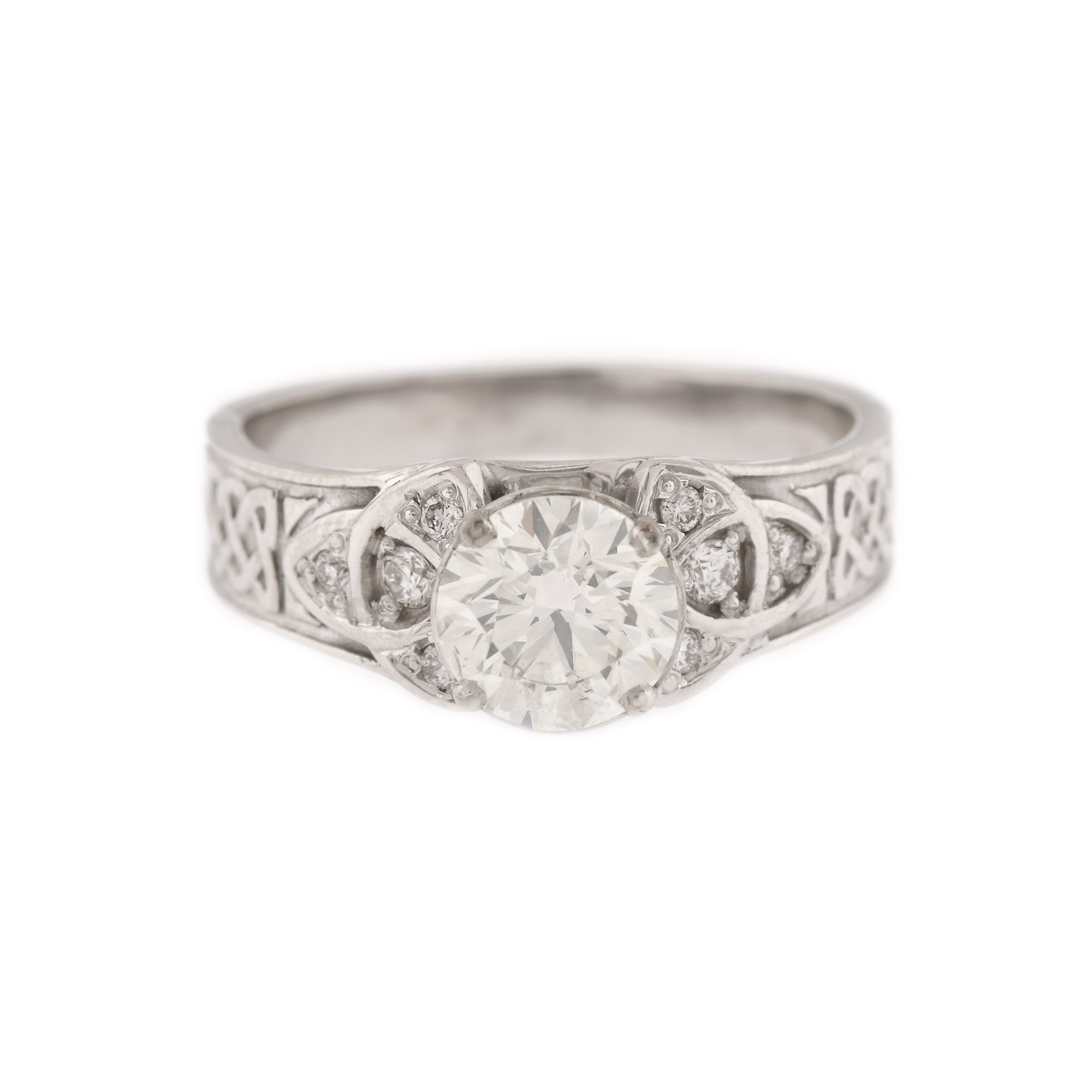 Ring, white gold, decorated with central diamond, Celtic elements and brilliants