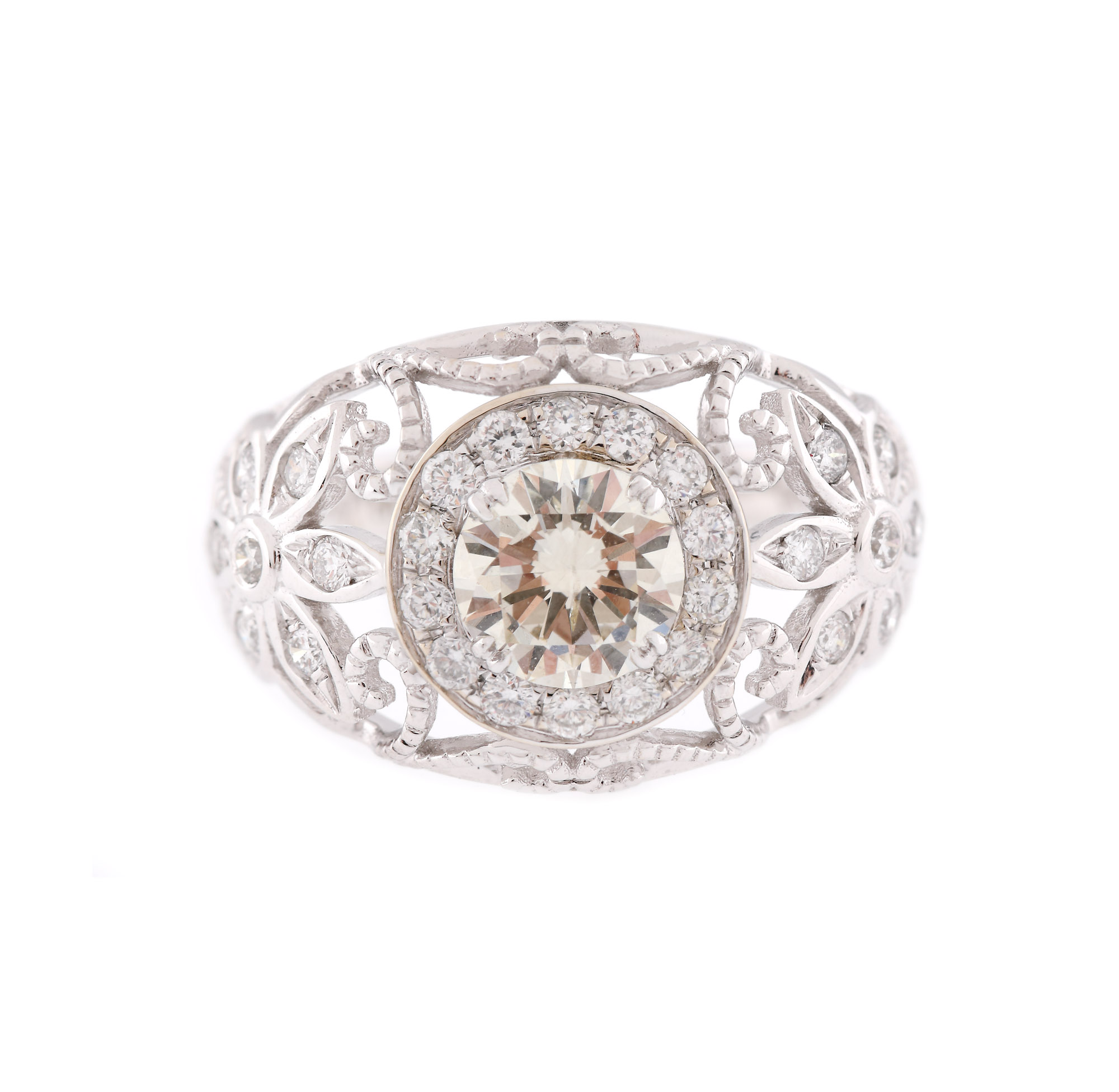 Inel din aur alb, cu model floral, decorat cu diamante