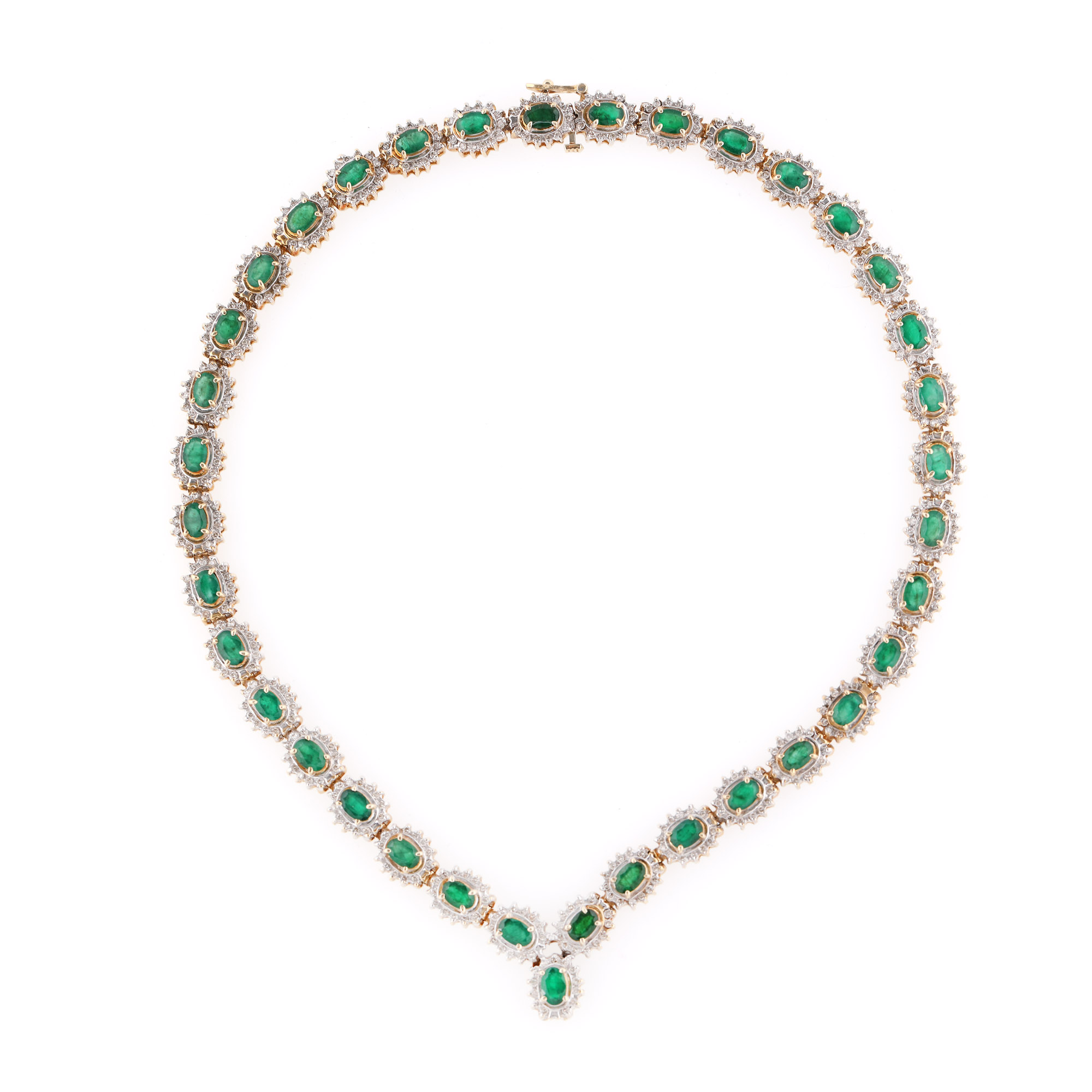 Imposing gold necklace, adorned with emeralds and diamonds