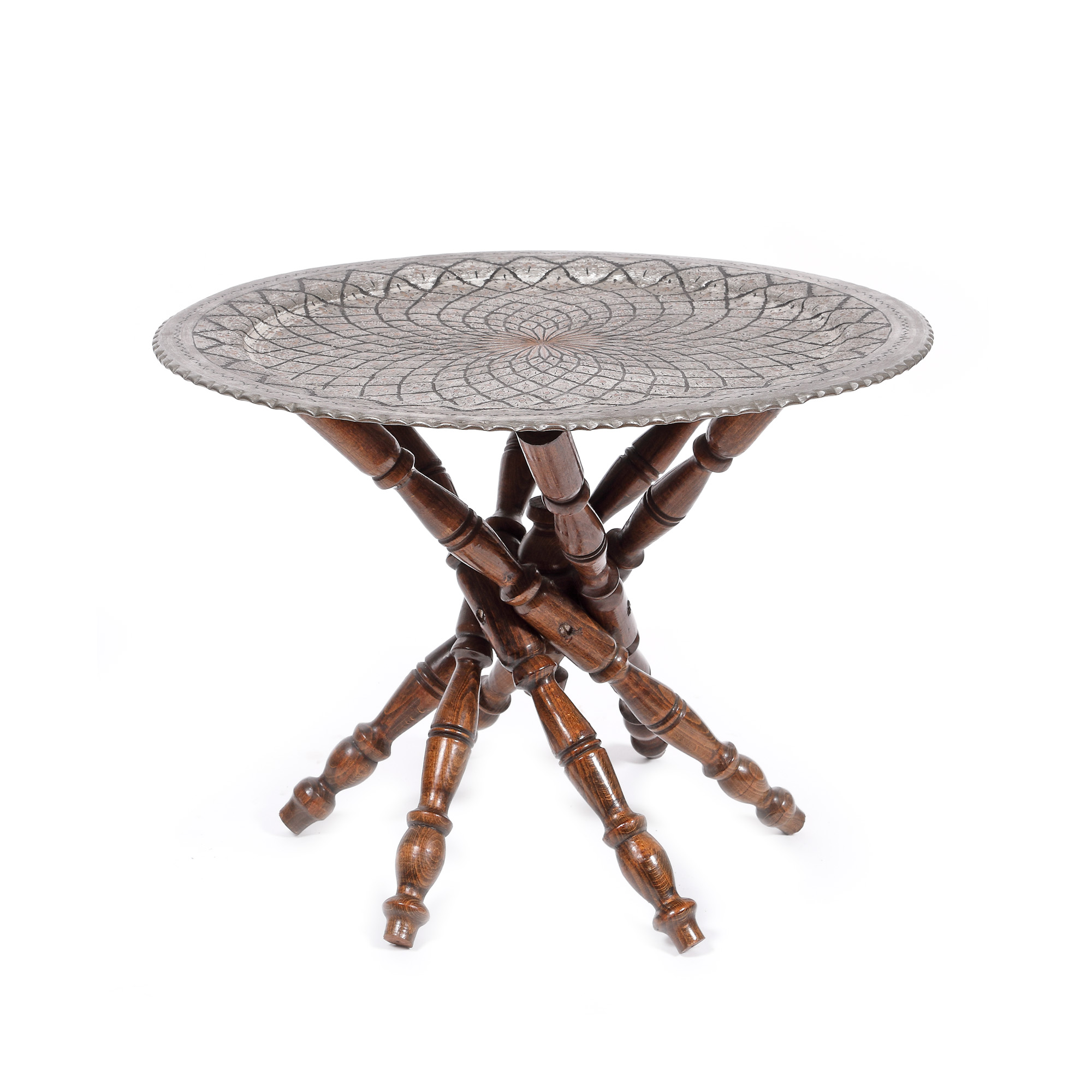 Table with circular copper top, decorated with arabesques, for serving tea, part of the Grigore Ghyka collection