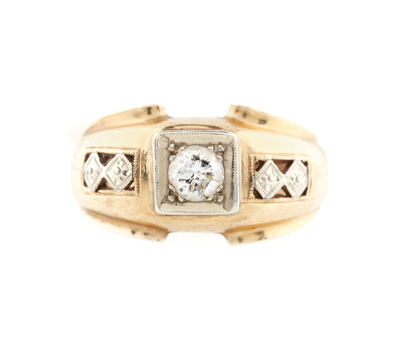 Gold ring set with a central diamond