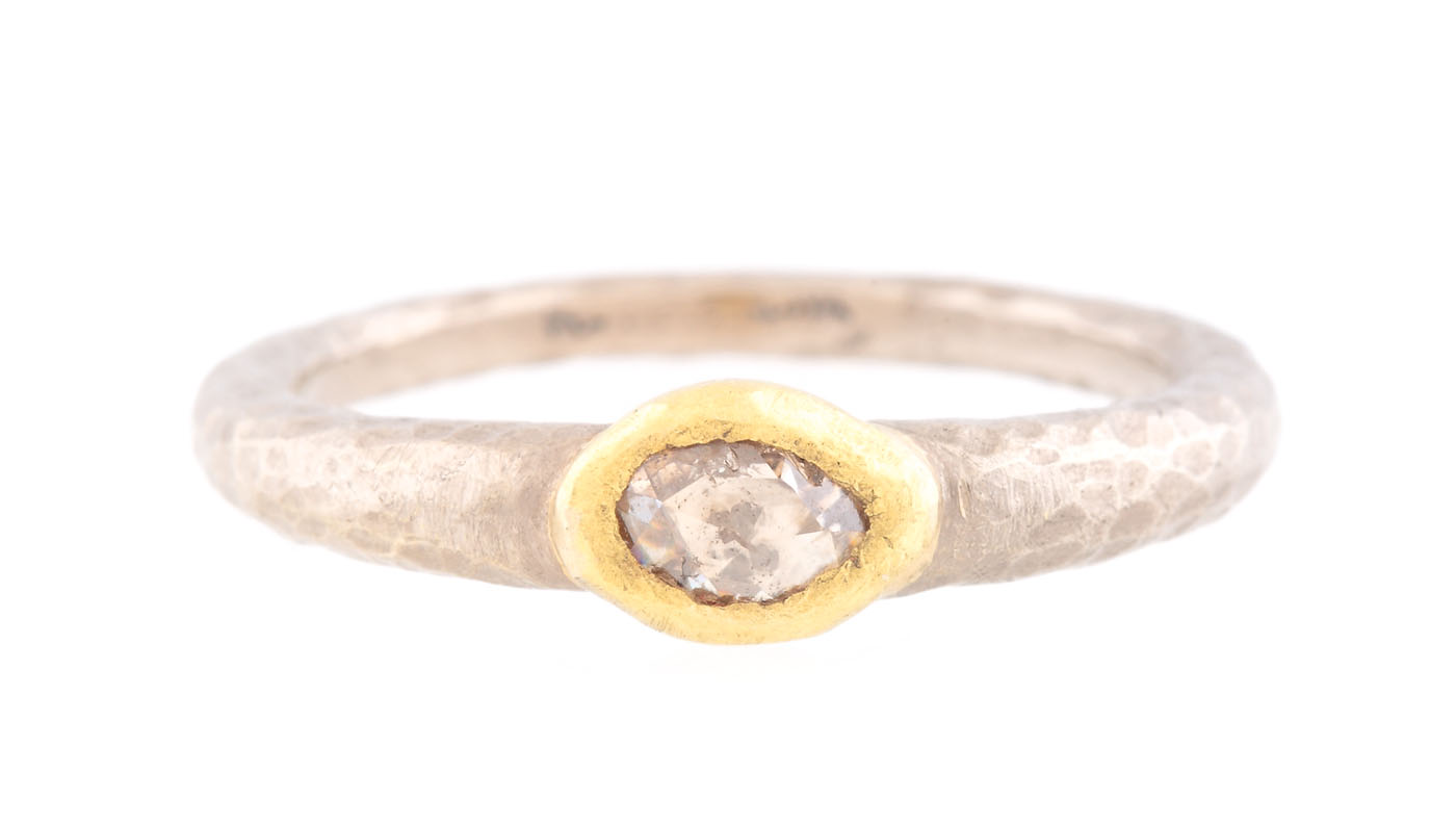 Poppy Dandiya gold ring, set with a brown diamond