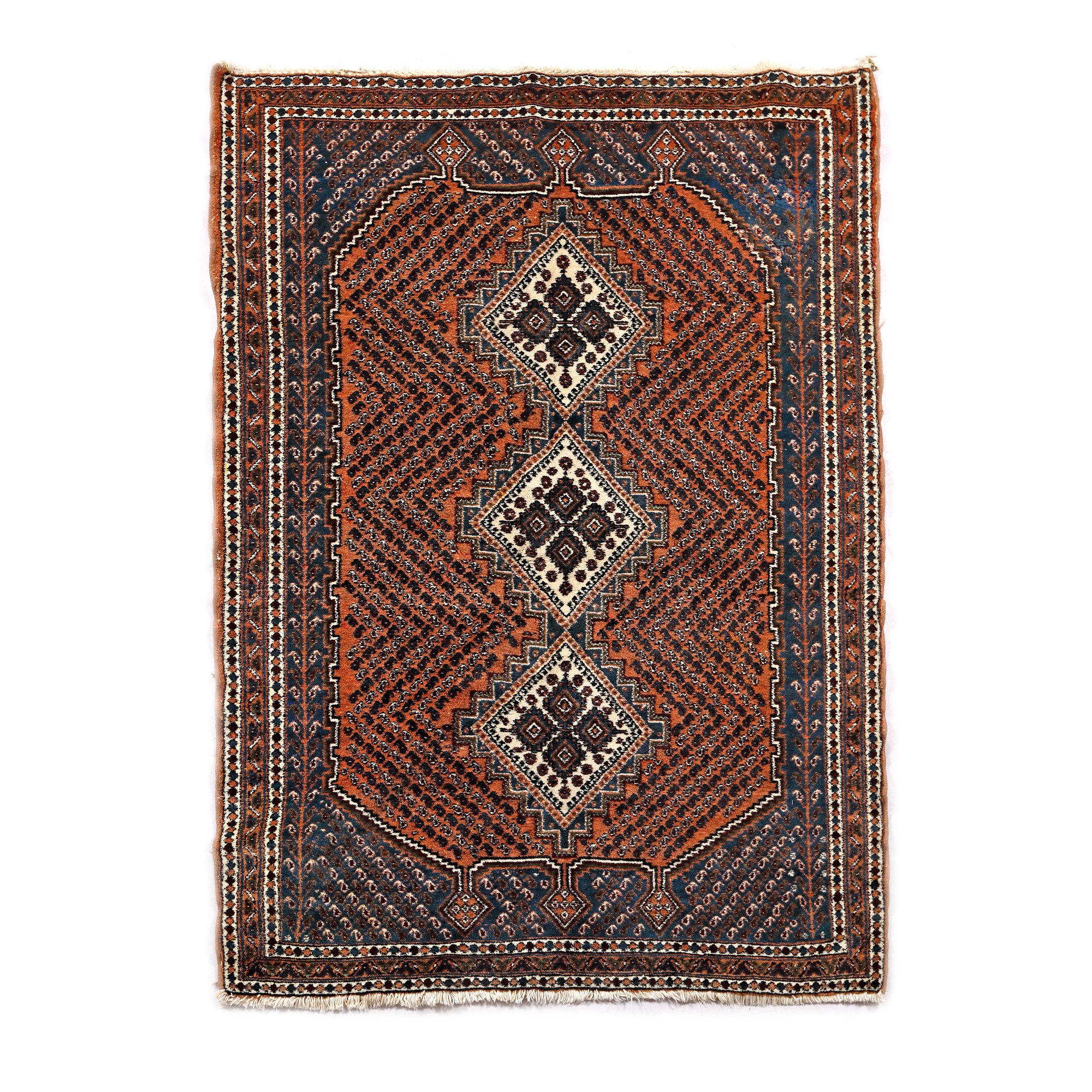 Beluch rug, wool on cotton warp, decorated with three medallions in the central field, Iran