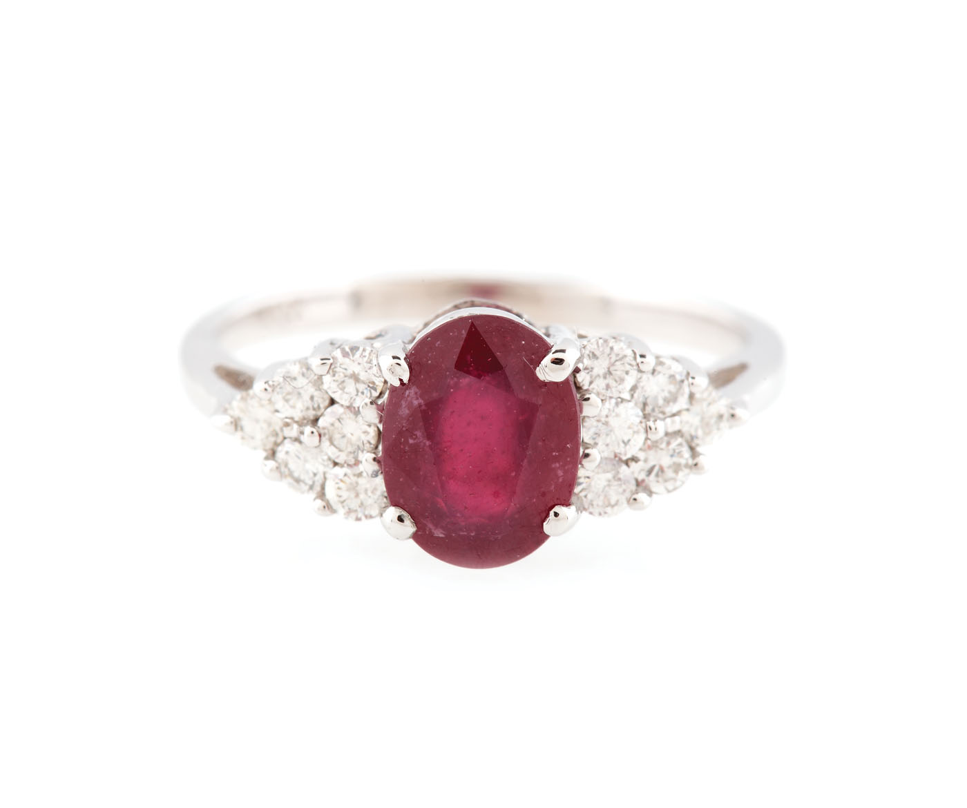 White gold ring, ornate with ruby and diamonds