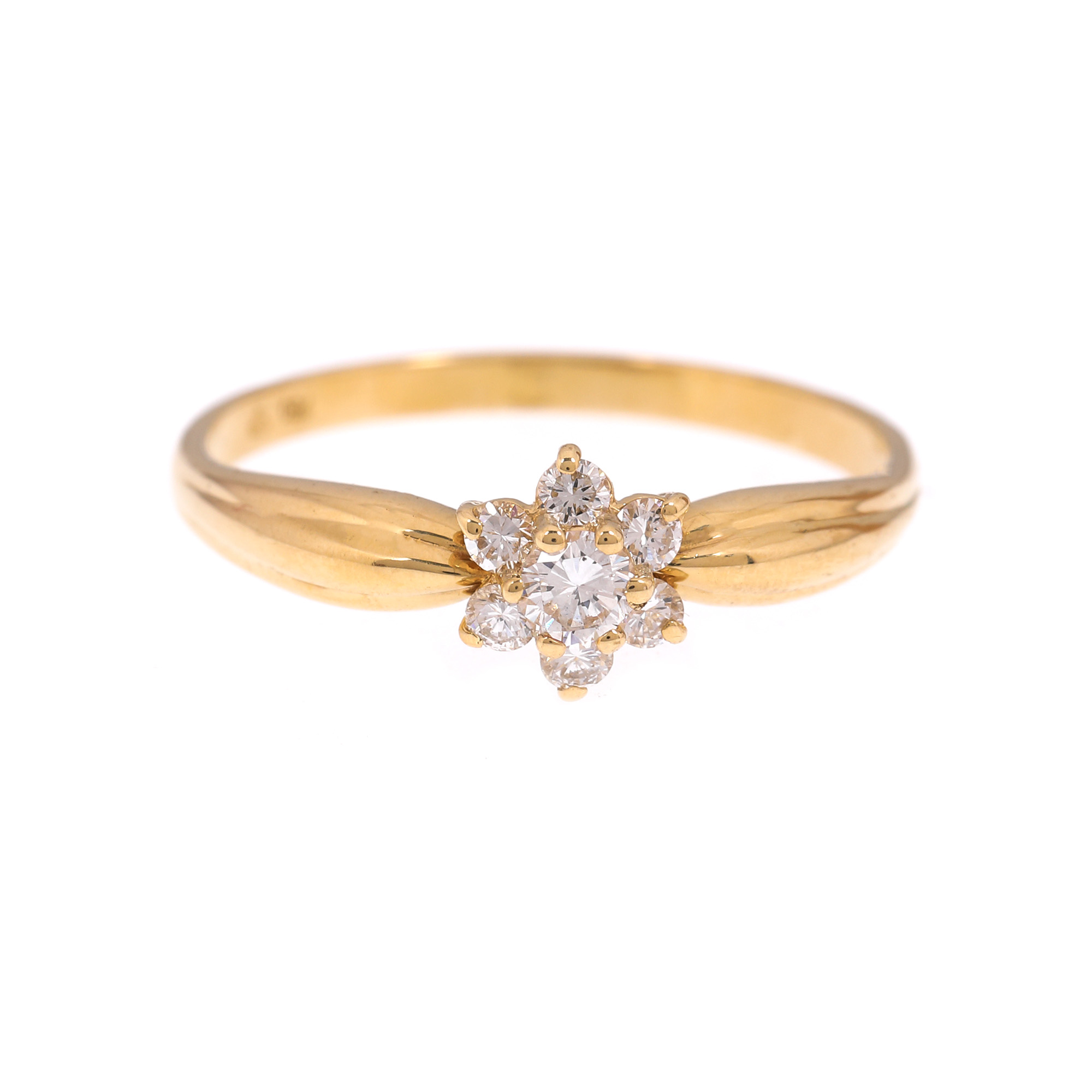 Gold ring, adorned with diamond flower