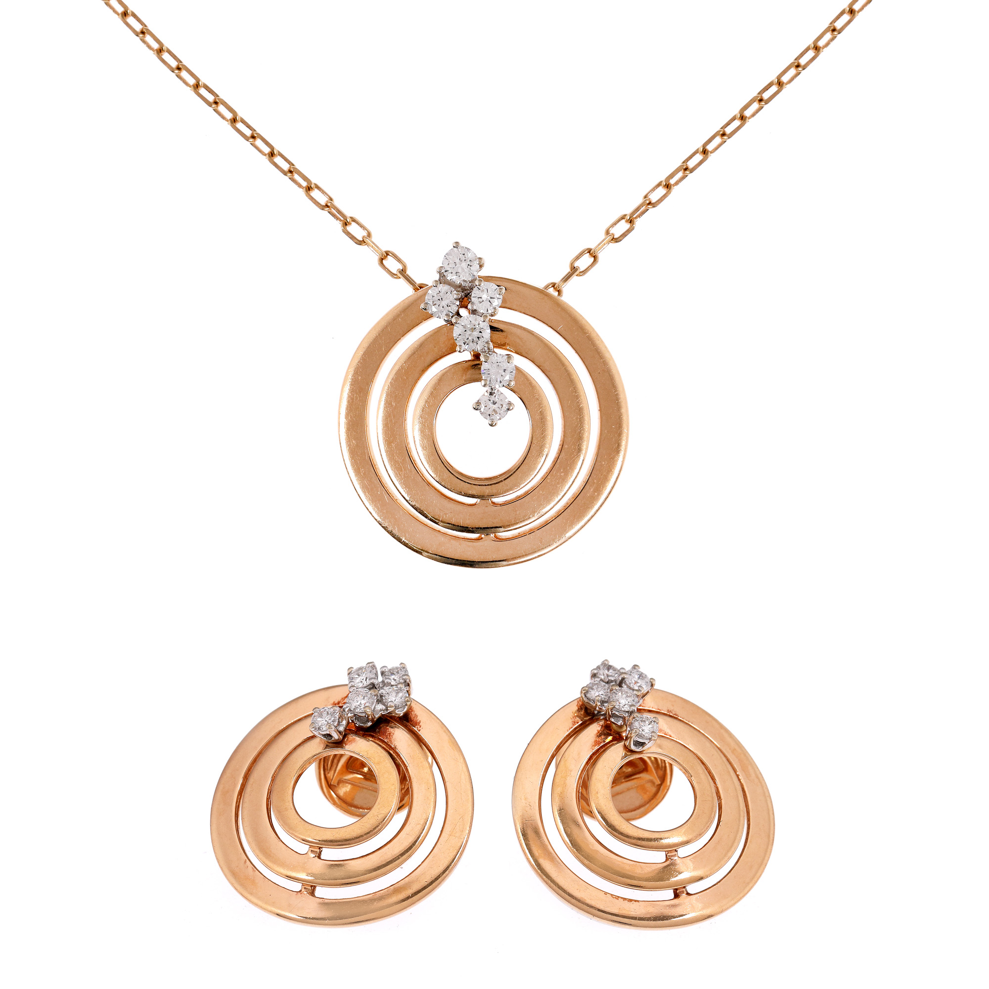 Damiani gold set, consisting of chain with pendant and pair of earrings, decorated with diamonds