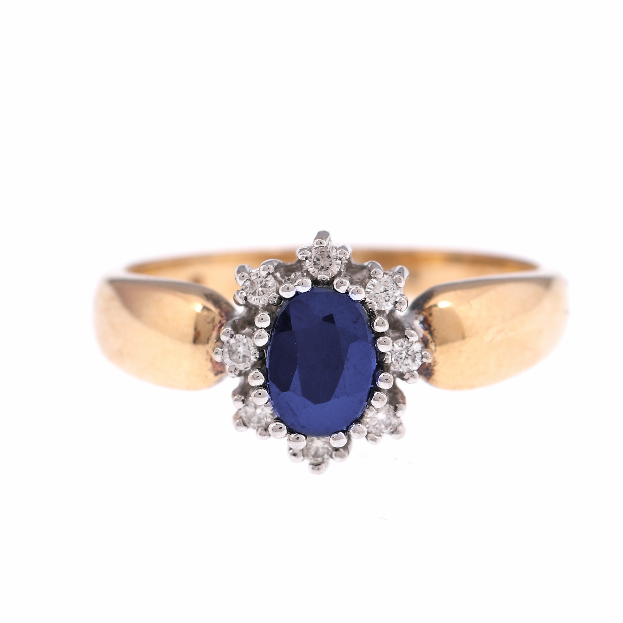 Gold ring, adorned with sapphire and diamonds