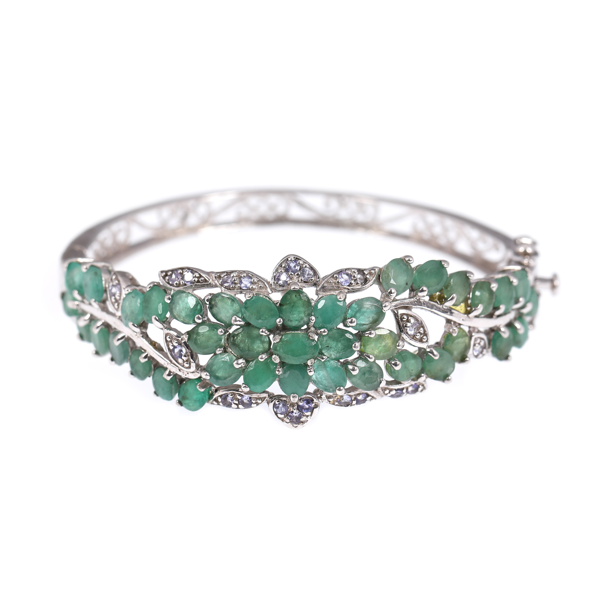 Silver set, consisting of bracelet, pair of earrings and ring, decorated with emeralds and tanzanites