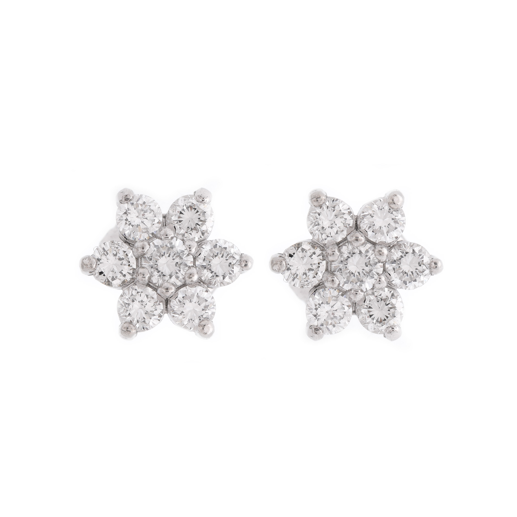 Pair of white gold earrings, floral pattern, decorated with diamonds