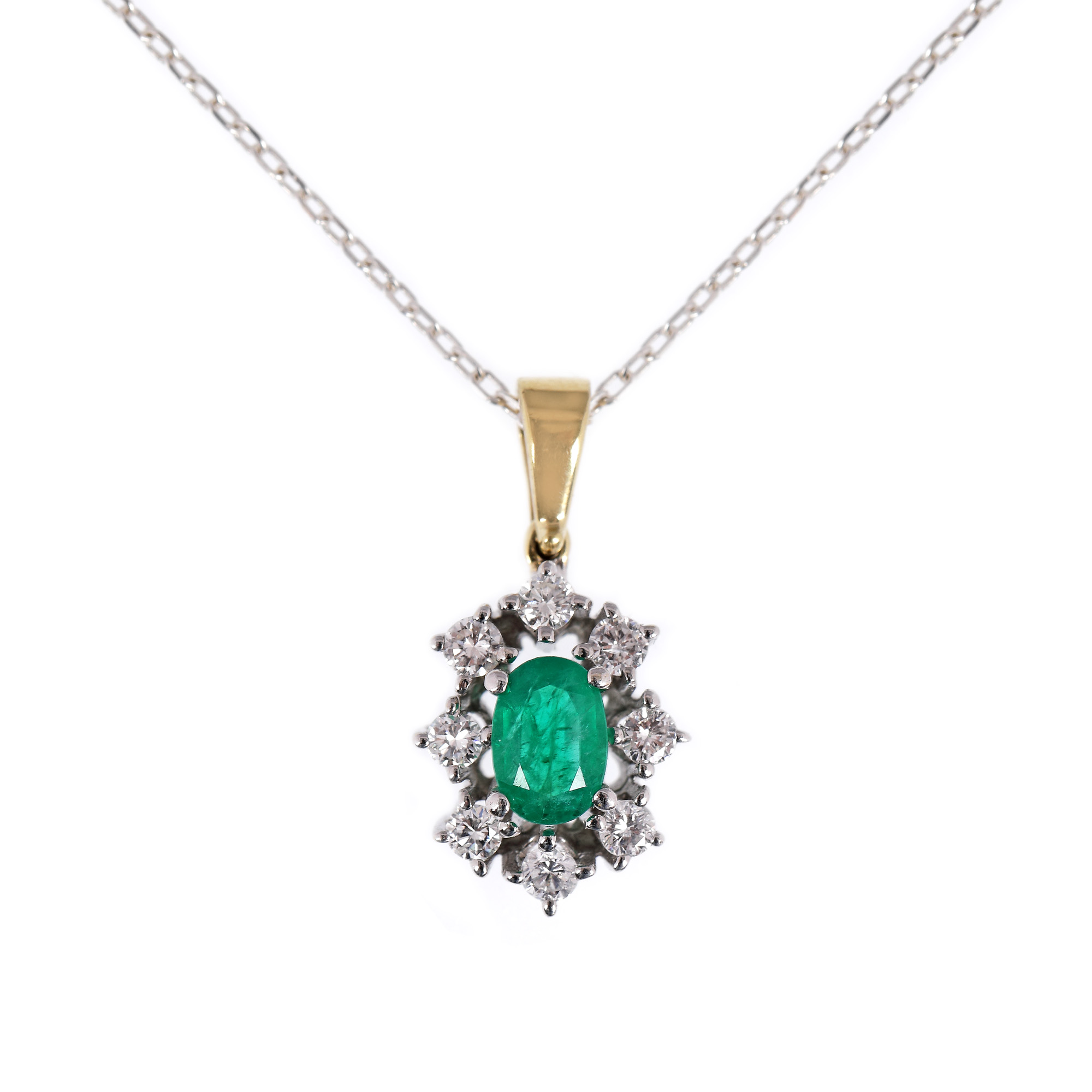 White gold chain with pendant, decorated with emerald and diamonds