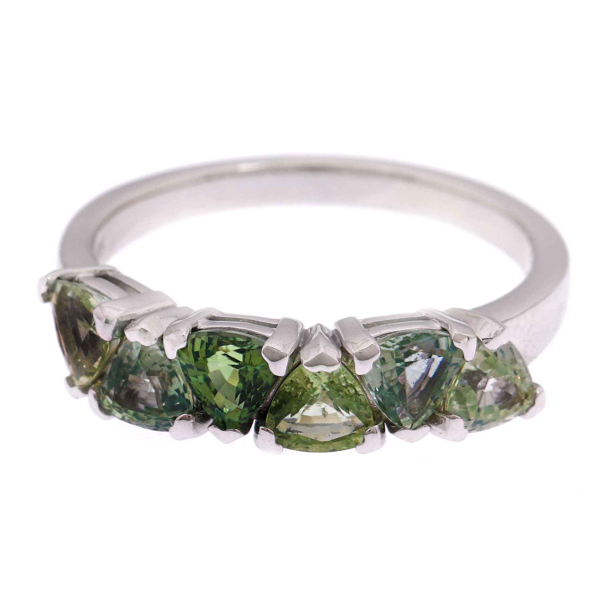 White gold ring, decorated with greenish-blue trillion cut sapphires