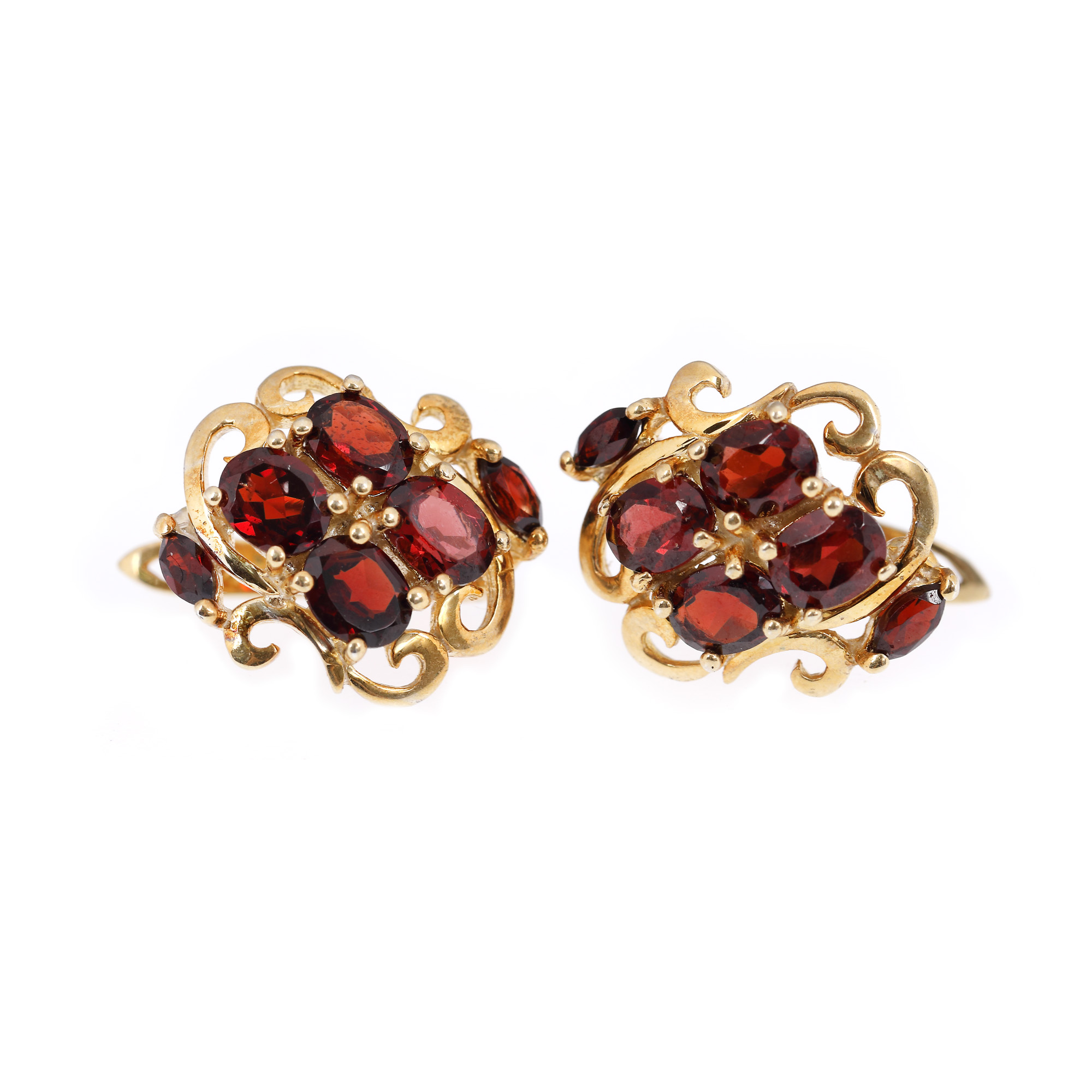 Pair of gilded silver earrings, adorned with garnets