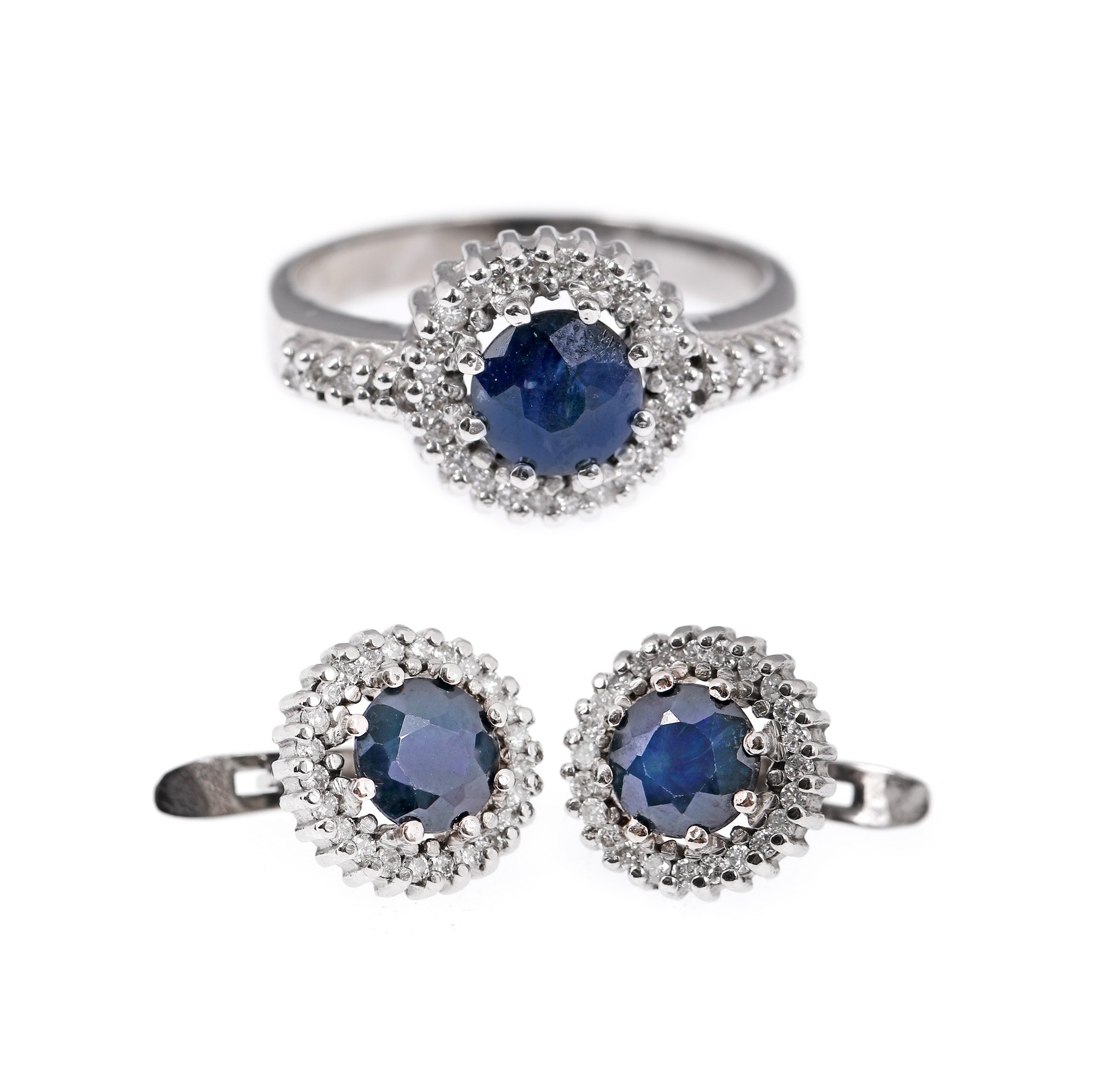 White gold set, consisting of pair of earrings and ring, decorated with sapphires and diamonds