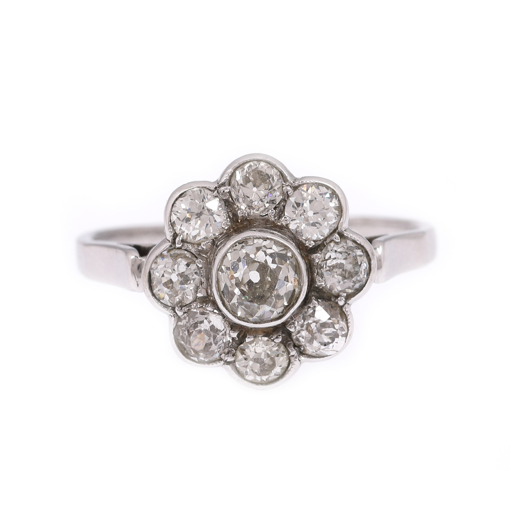 White gold ring, floral pattern, decorated with diamonds