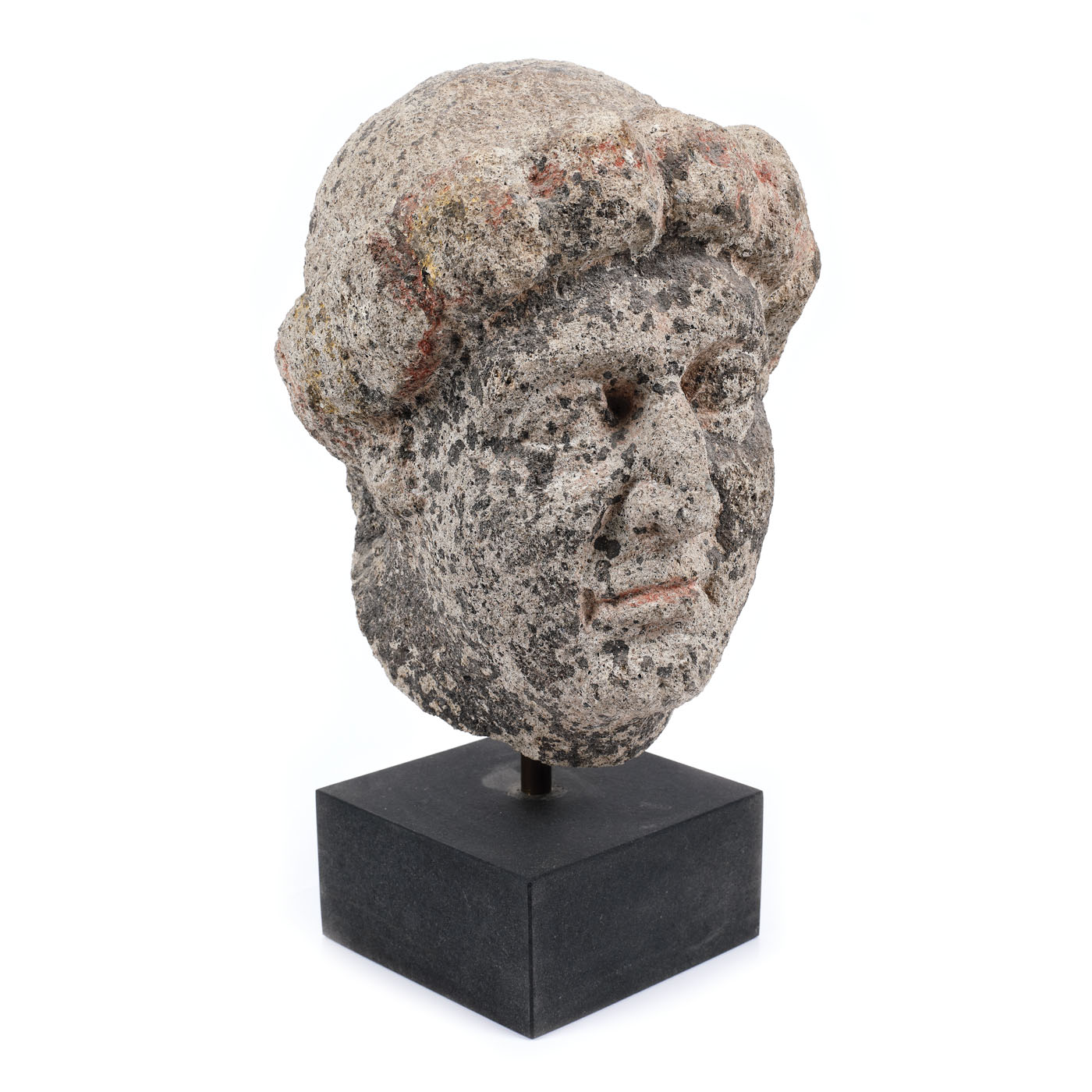 Fragment of a Roman statuette illustrating the head of a man, partially painted, the 5th century