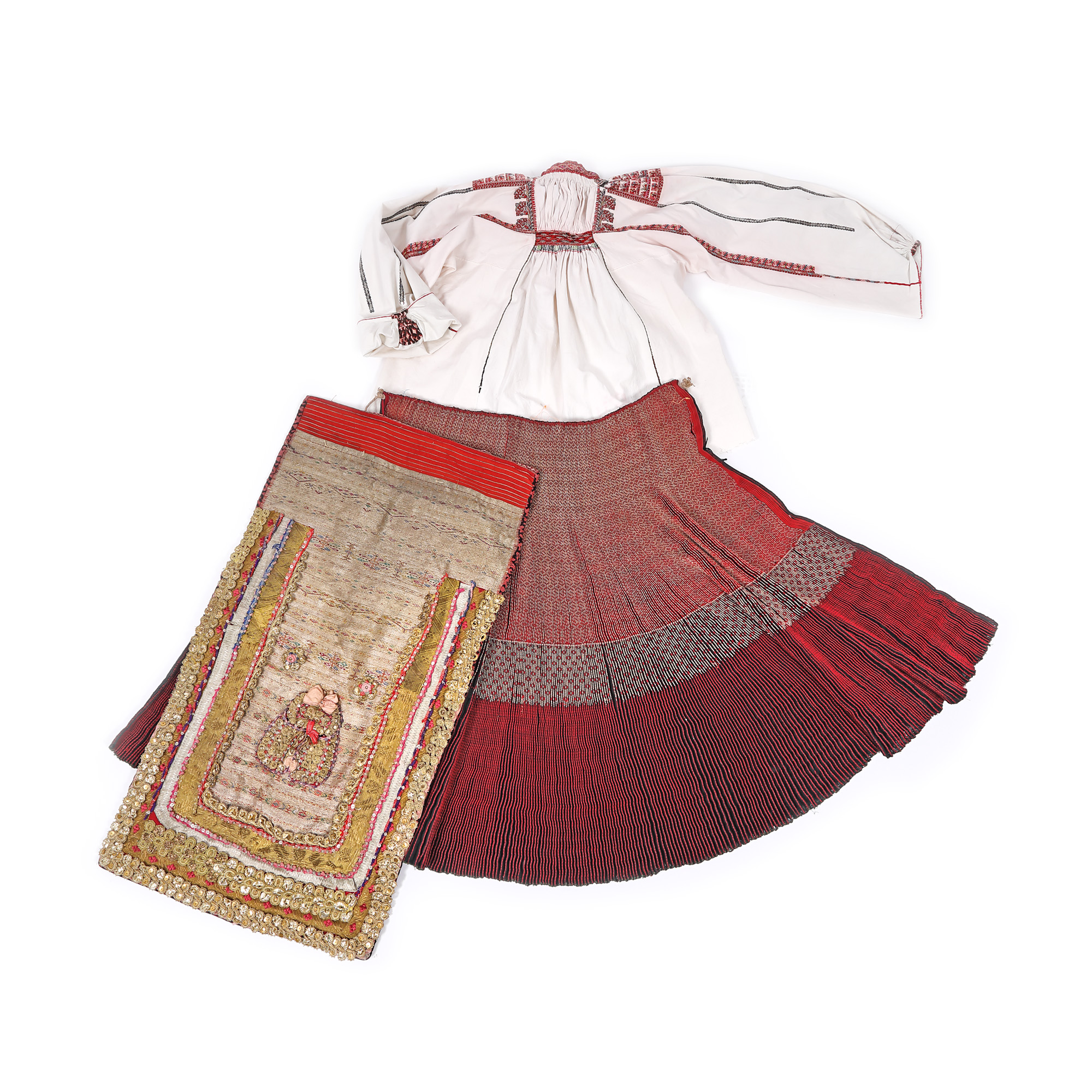 Folk costume consisting of ie (embroidered blouse) and vâlnic (traditional skirt apron from Oltenia) and whisk, the Bulgarian minority of Dudeștii Vechi, Banat, beginning of the 20th century, museum piece 