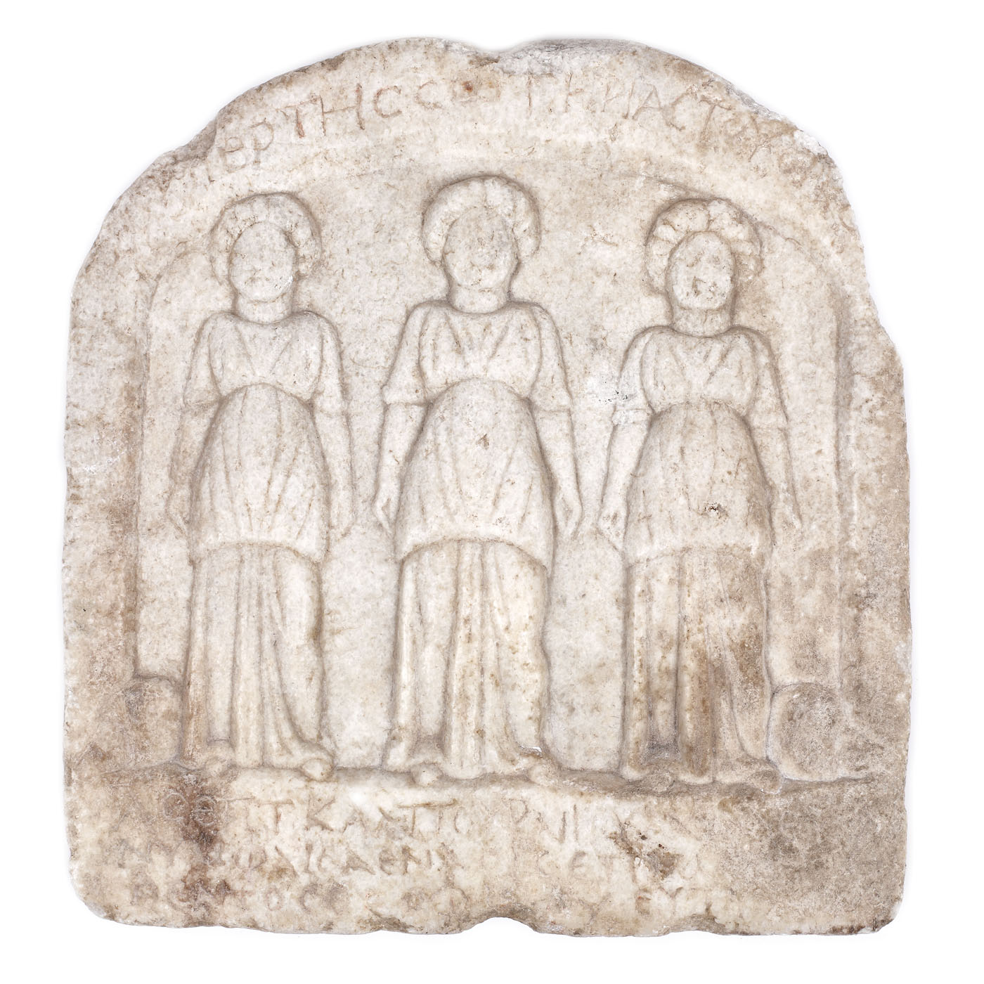 Marble votive relief illustrating three female faces, the Roman period, the 2nd-3rd century BCE, from the collection of diplomat Vasile Stoica 