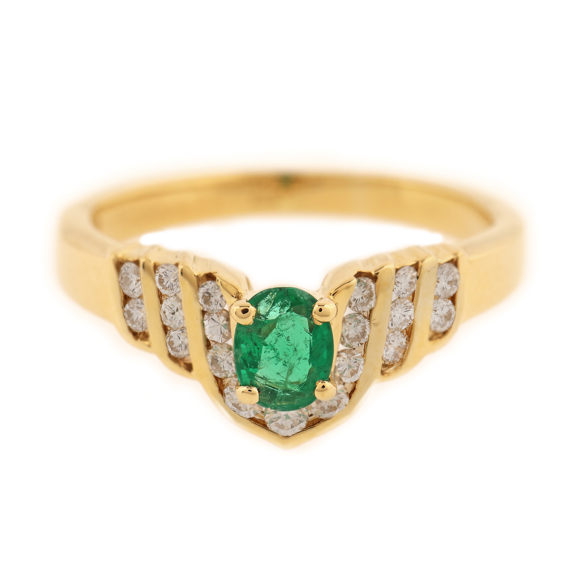 Gold ring, decorated with emerald and diamonds