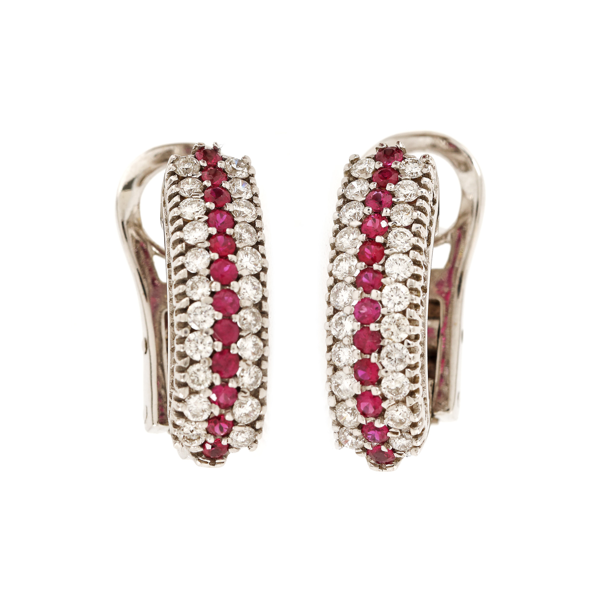 Pair of white gold earrings, decorated with rubies and diamonds