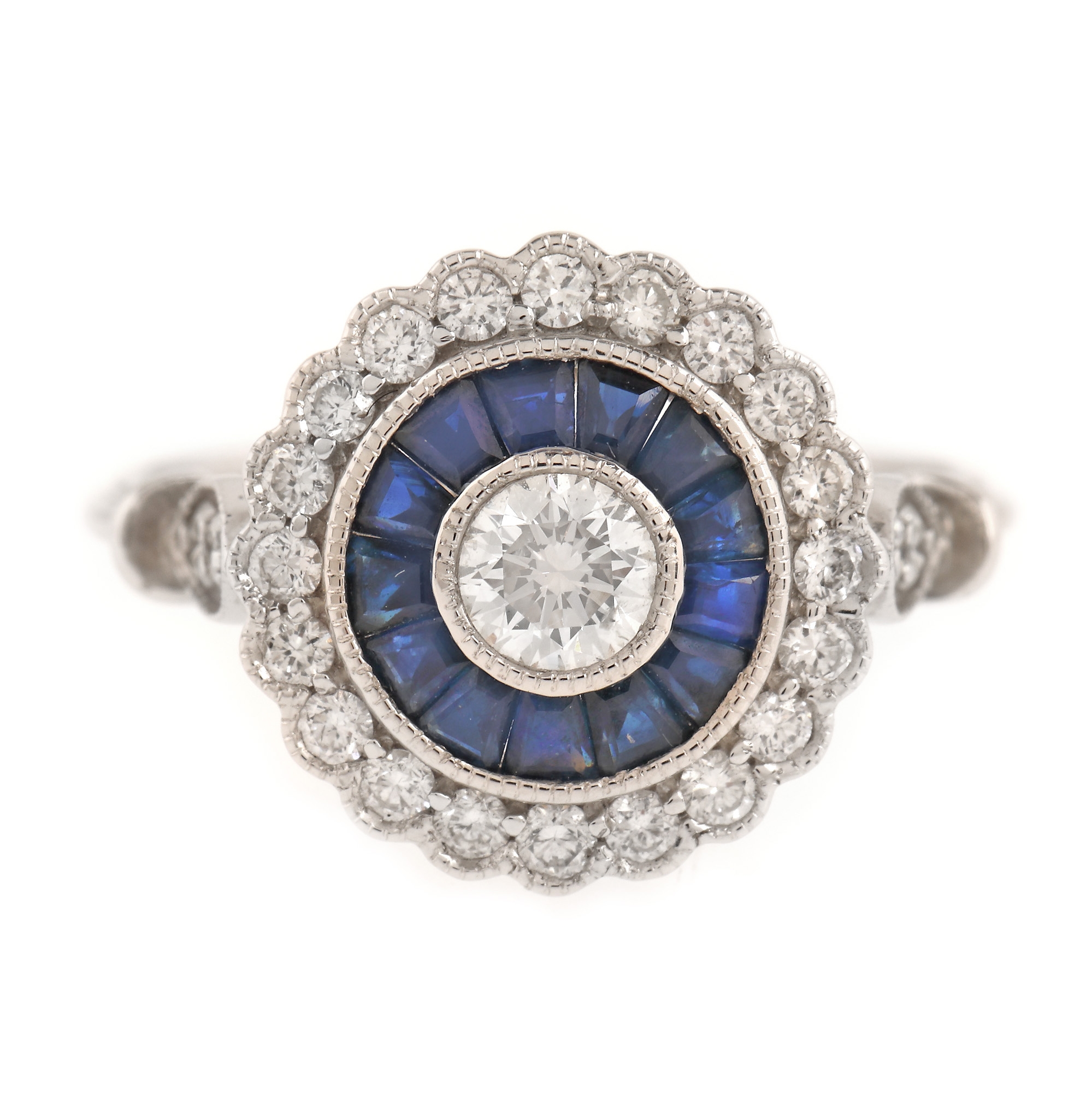 White gold ring, decorated with sapphires and diamonds