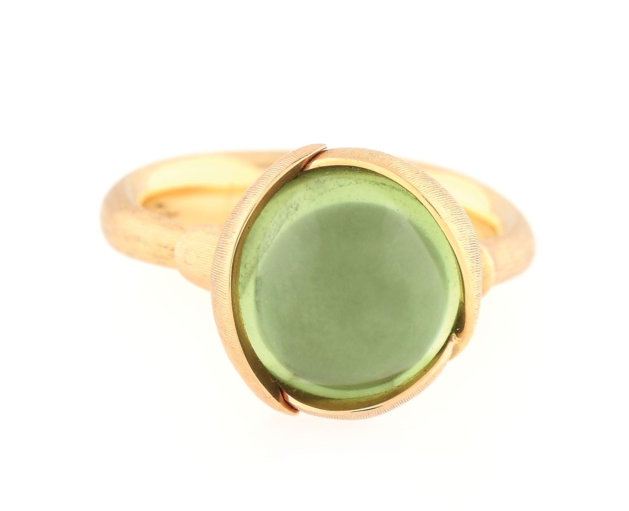 Frumos inel Ole Lynggaard din aur, decorat cu peridot