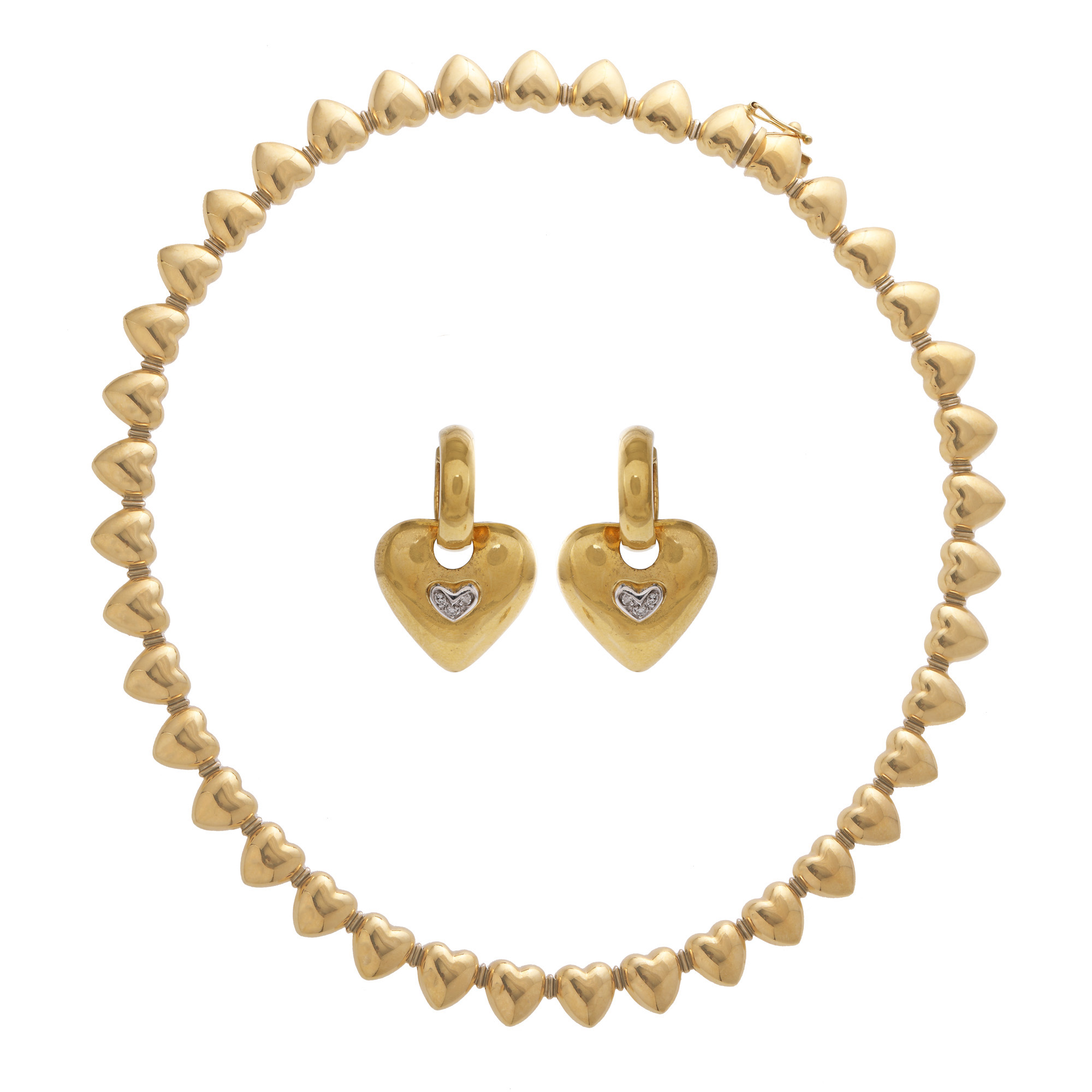 Two-tone gold set, consisting of necklace and pair of earrings, decorated with diamonds