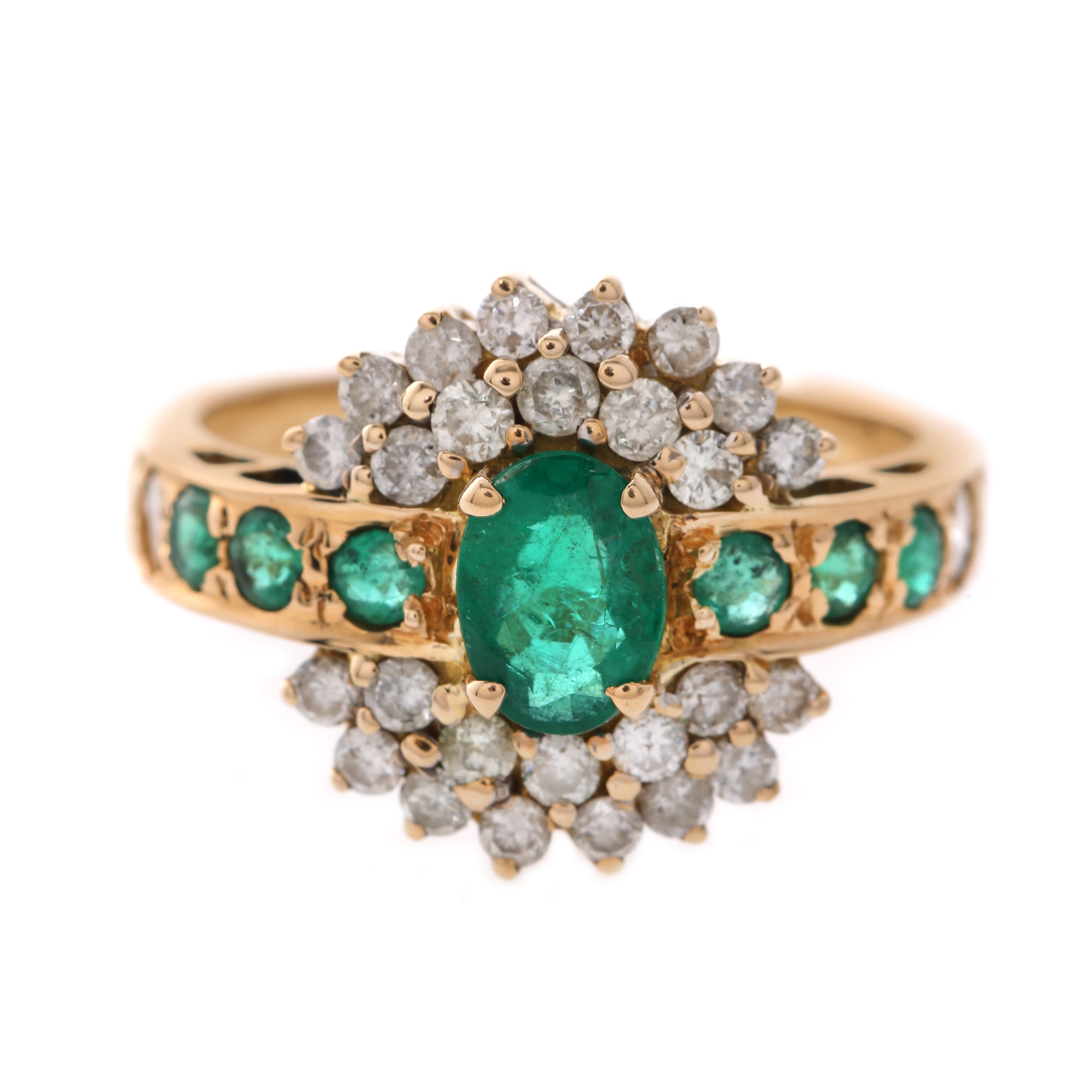 Gold ring, decorated with emeralds and diamonds