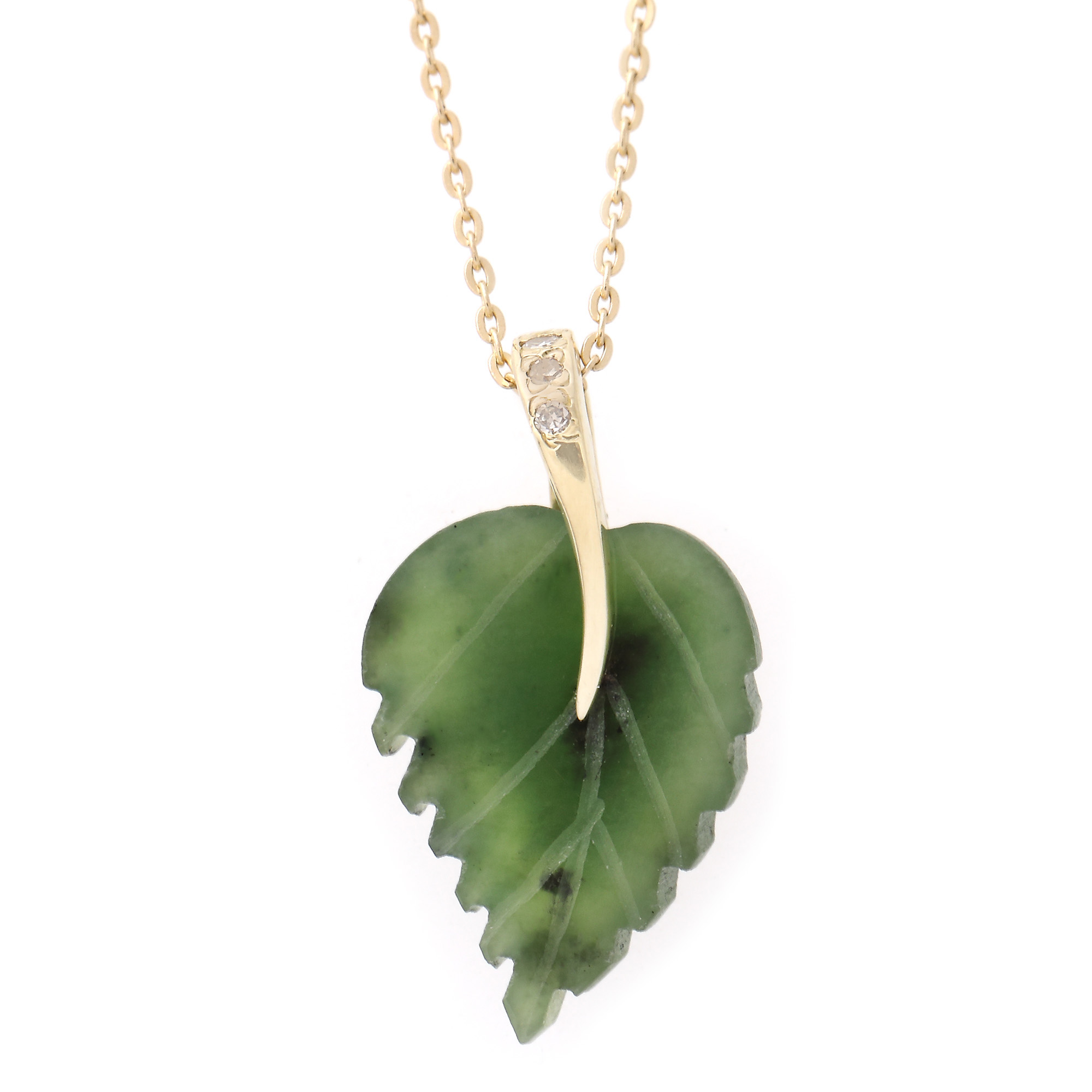 Gold necklace with pendant, decorated with carved nephrite
