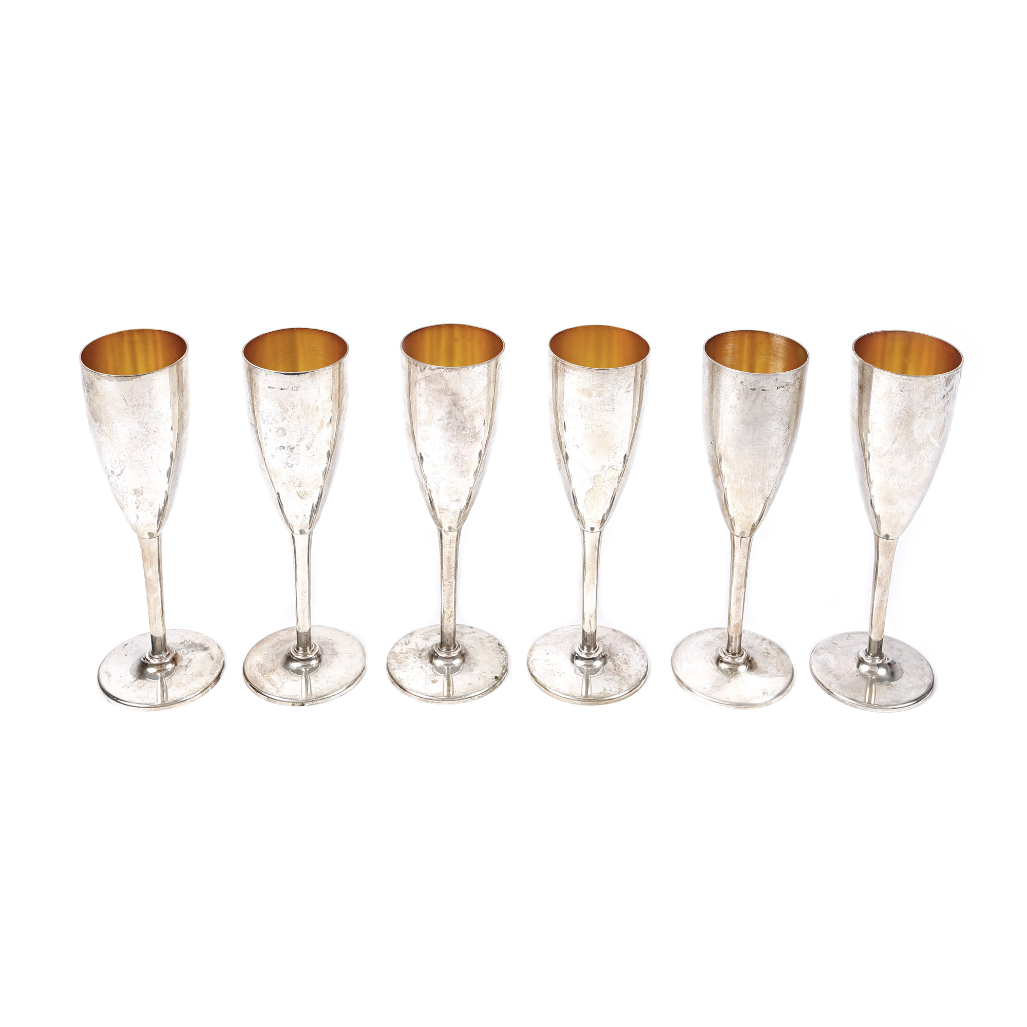 Set din argint parțial aurit, format din șase pahare cu picior pentru champagne