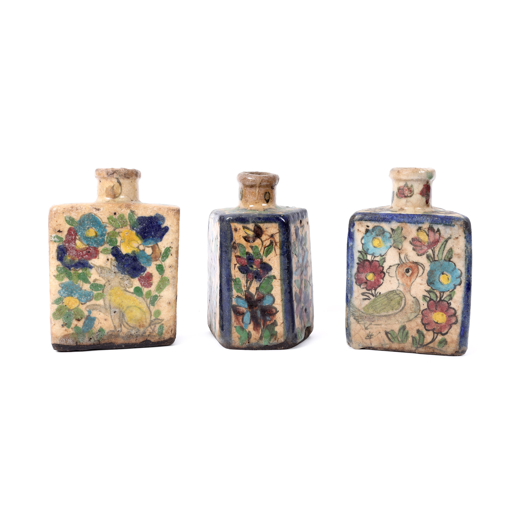Lot consisting of three Persian ceramic vases, painted with zoomorphic and floral motifs, Iran, 19th century 
