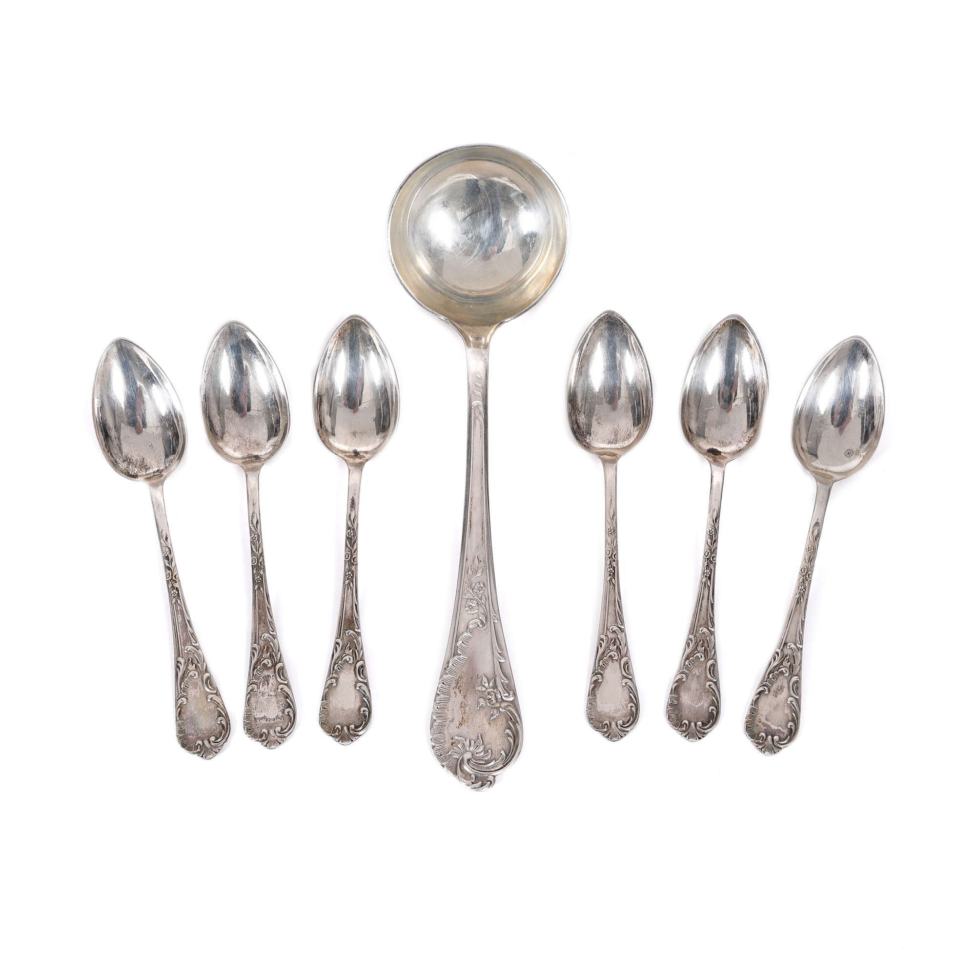 Silver set of six spoons and ladle, decorated with floral motifs, early 20th century, with original box