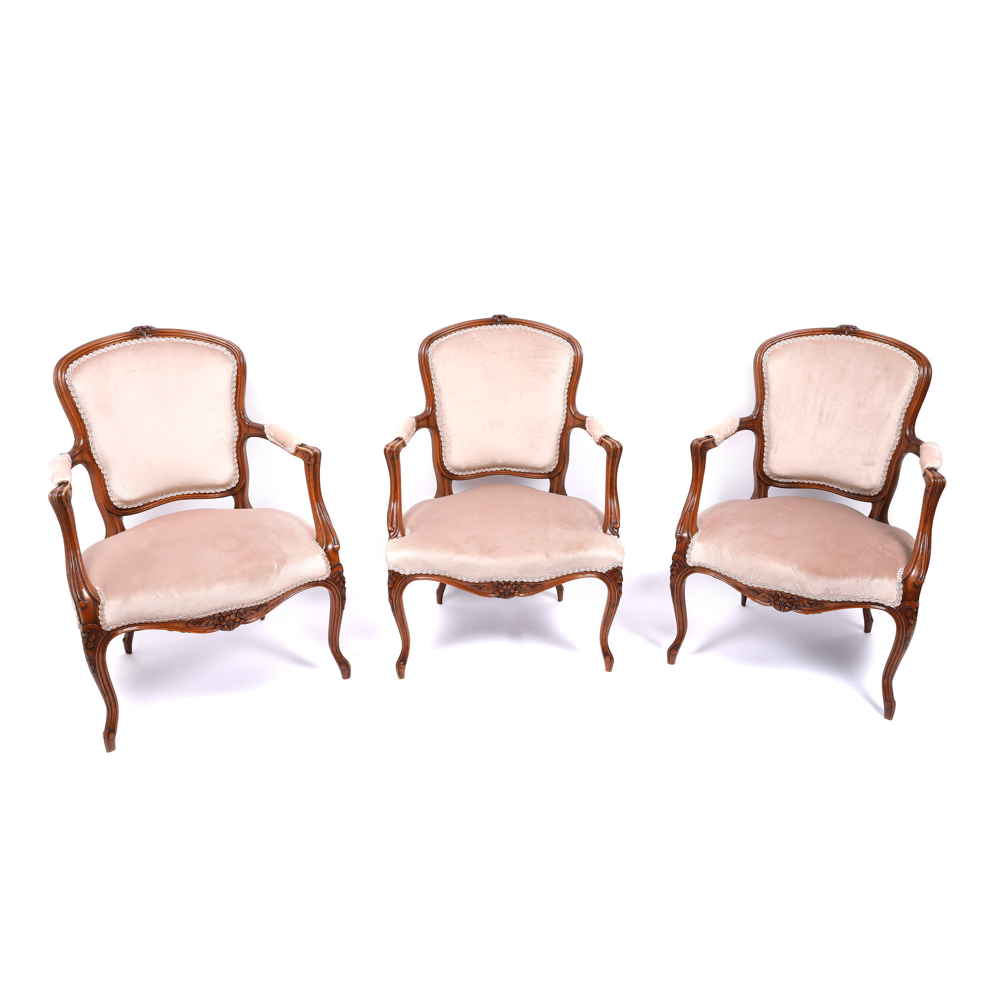Set of three Louis Philippe armchairs with carved floral motifs