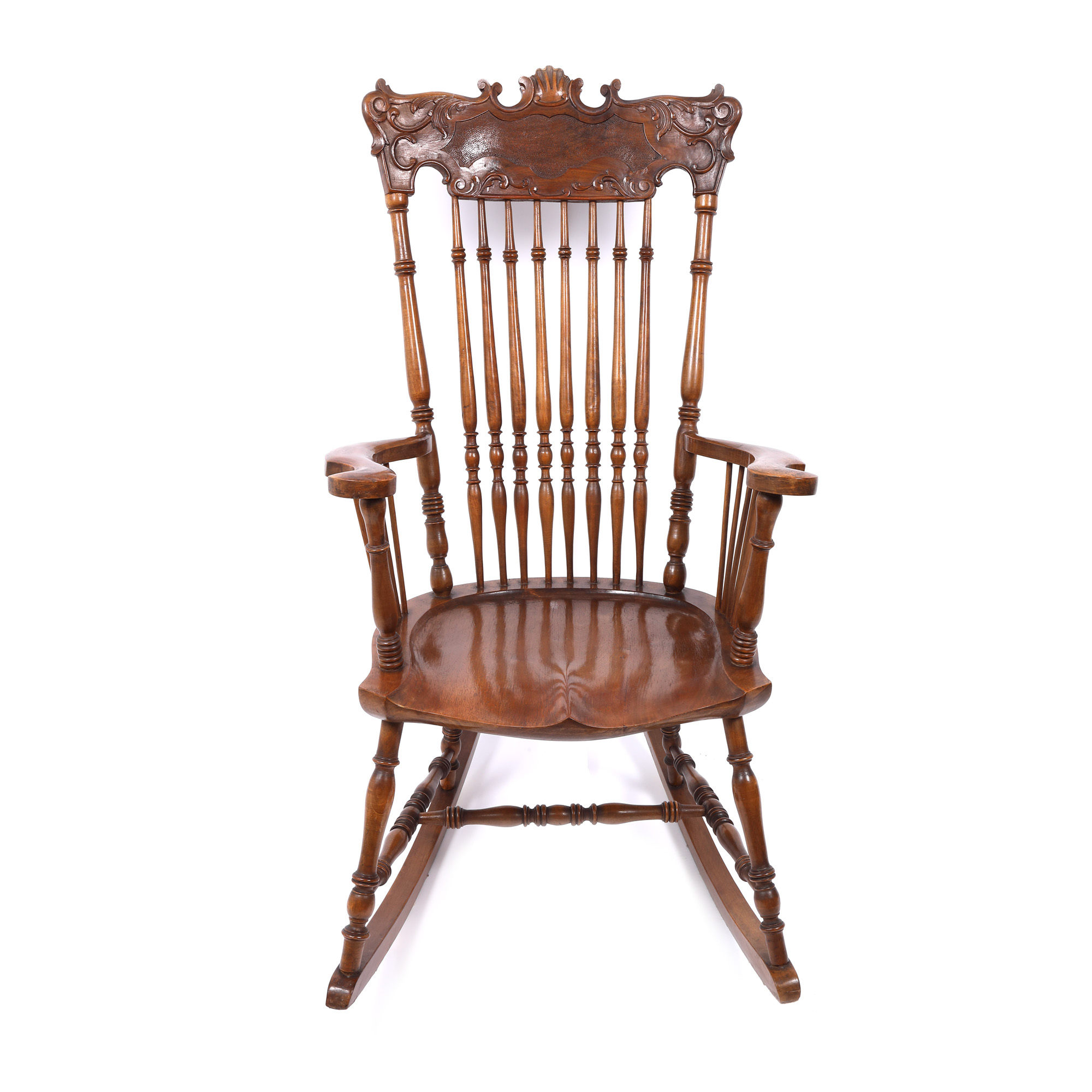 Walnut rocking chair decorated with vegetal motifs, first half of 20th century 