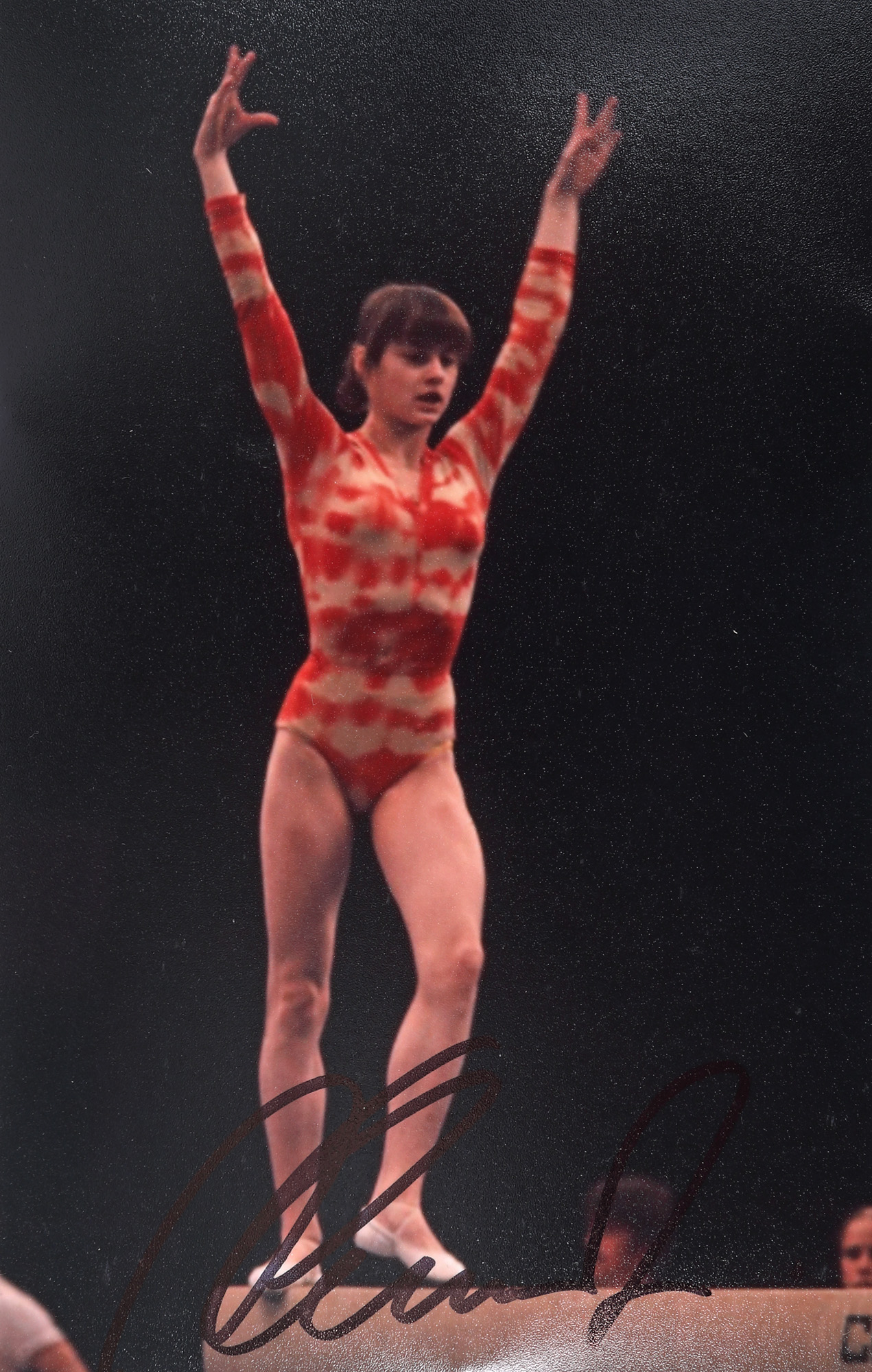 Photograph of Nadia Comăneci, with handwritten signature, circa 1976