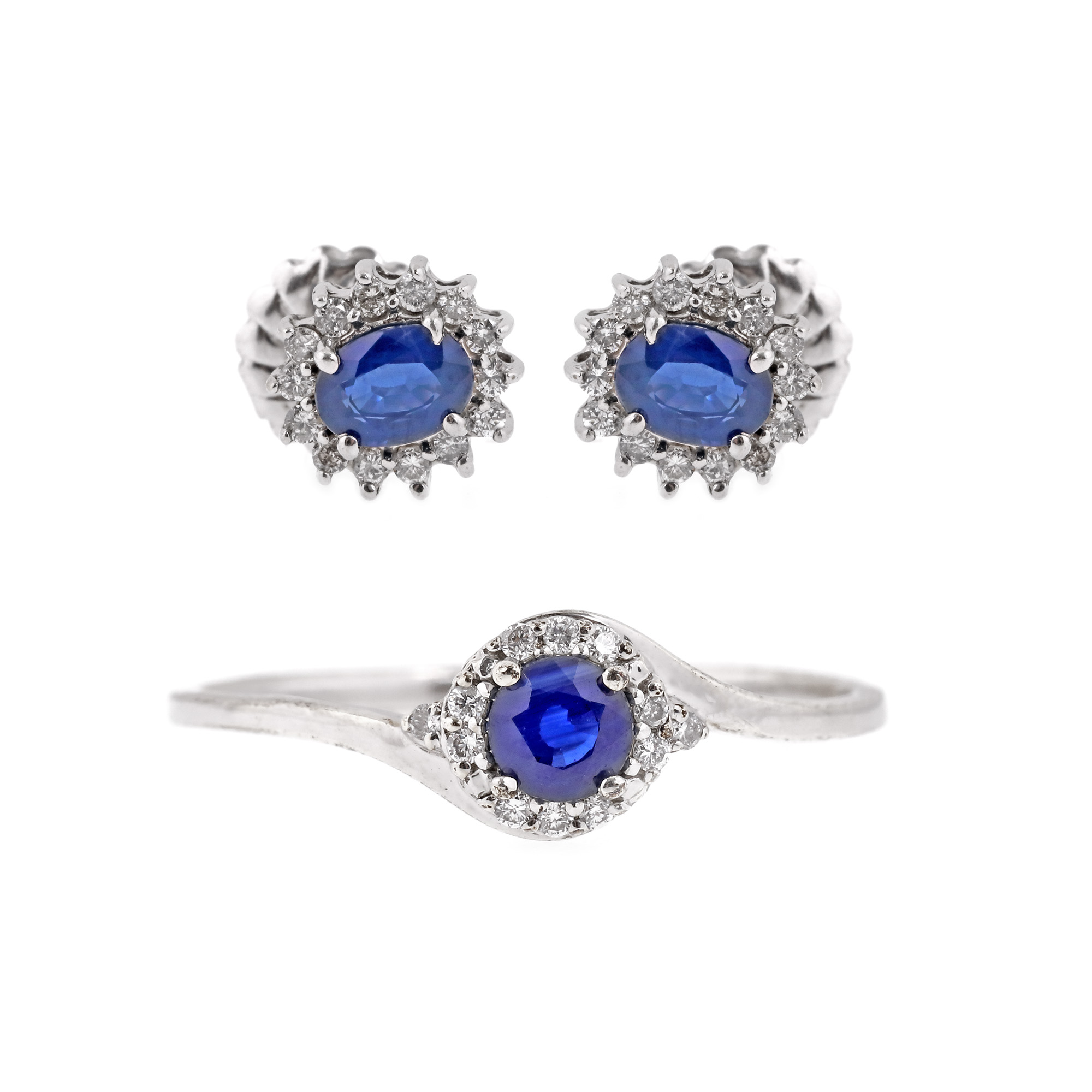 White gold set, consisting of pair of earrings and ring, decorated with sapphires and diamonds