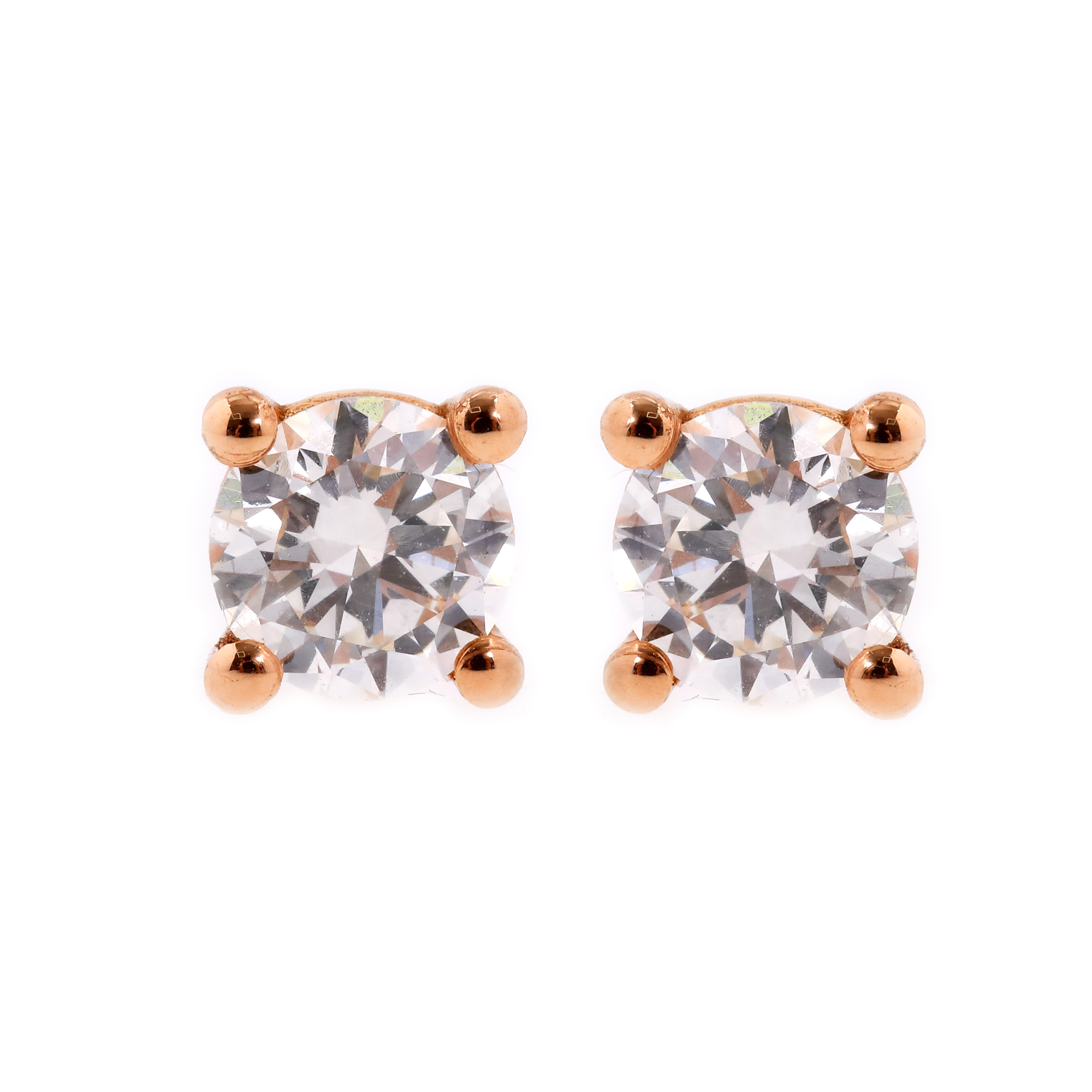 Pair of rose gold earrings, decorated with two brilliants