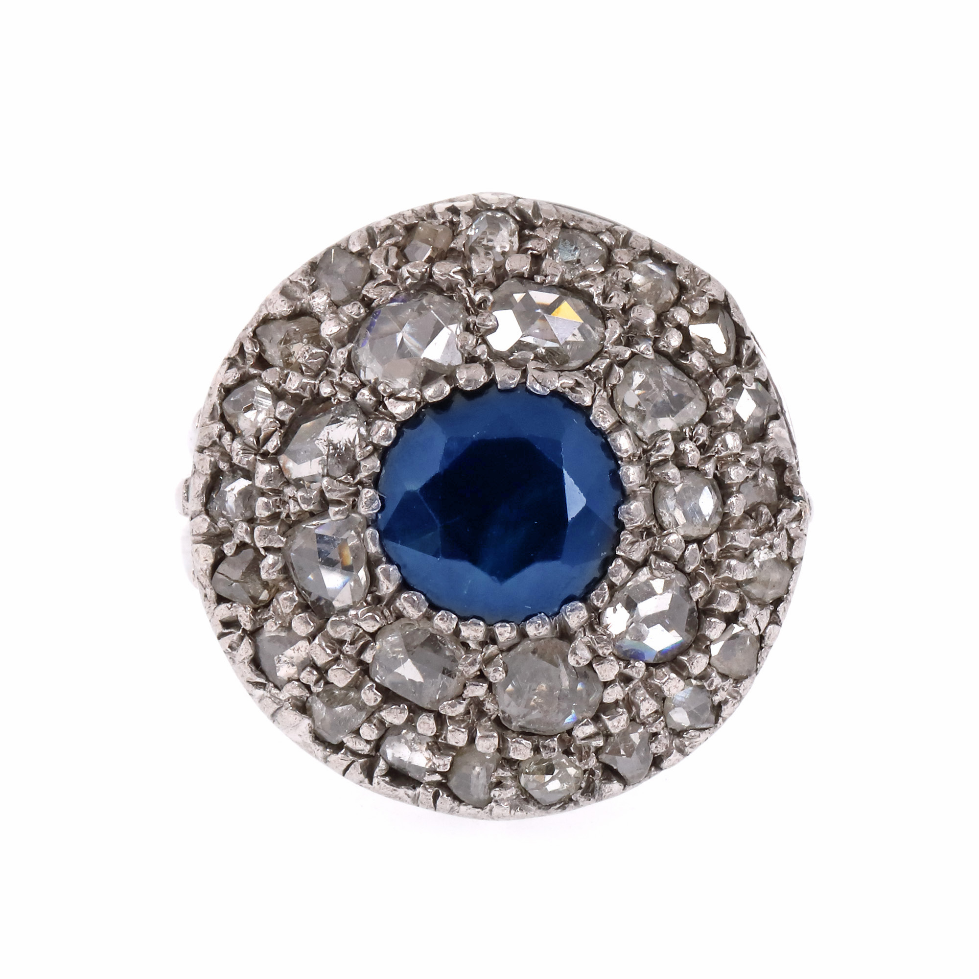 White gold and silver ring, decorated centrally with sapphire, set with diamonds