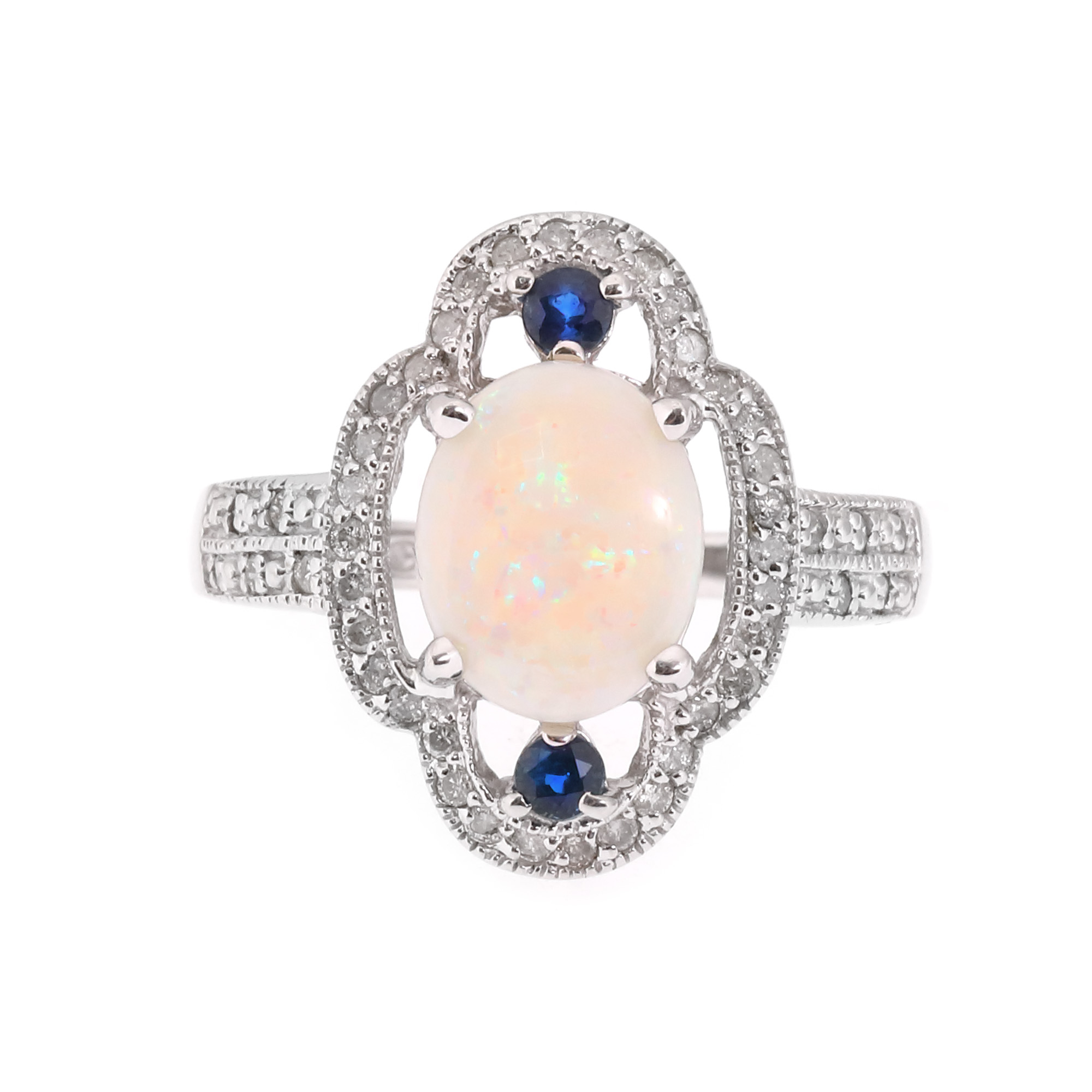 White gold ring, decorated with opal, sapphires and diamonds