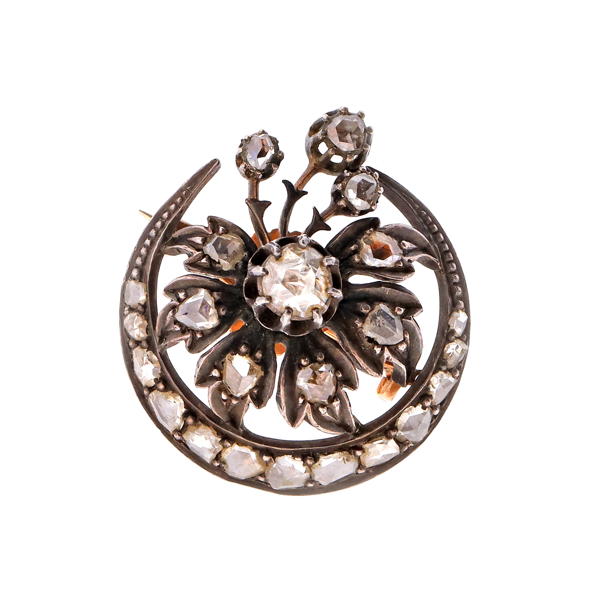 Red gold and silver brooch, decorated with diamonds, approx. 1900