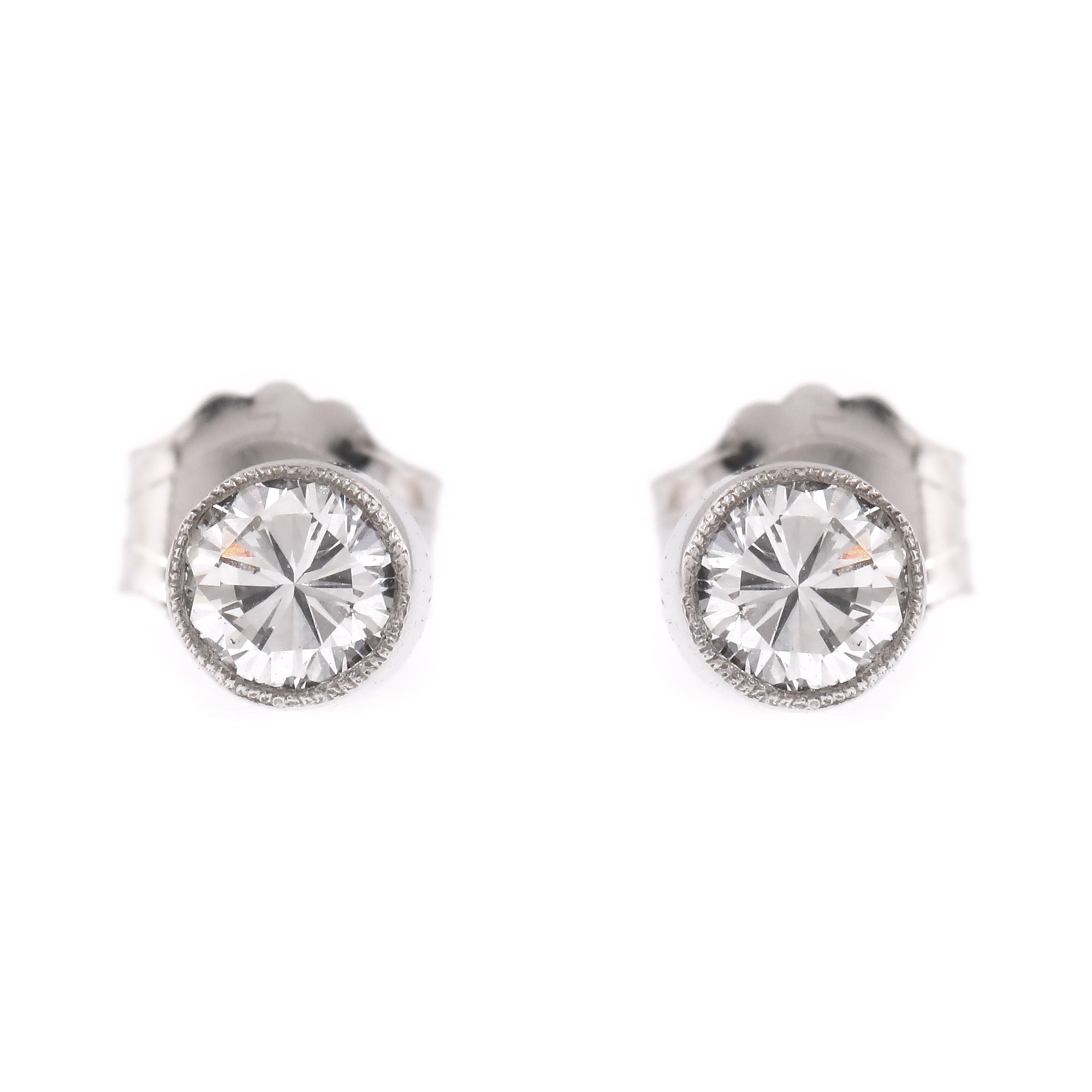 Pair of white gold and silver earrings, decorated with diamonds
